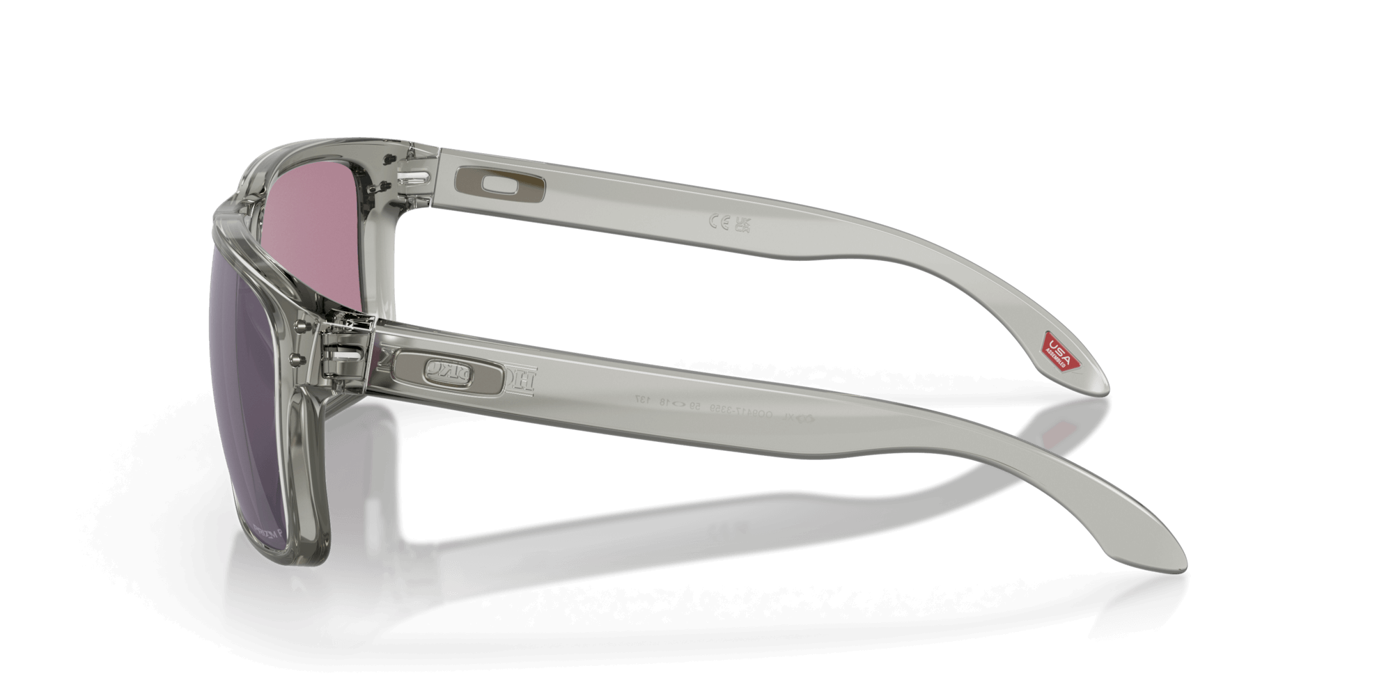 Oakley Holbrook XL Gray Ink frame sunglasses with pink lenses, showcasing durable design and stylish features.