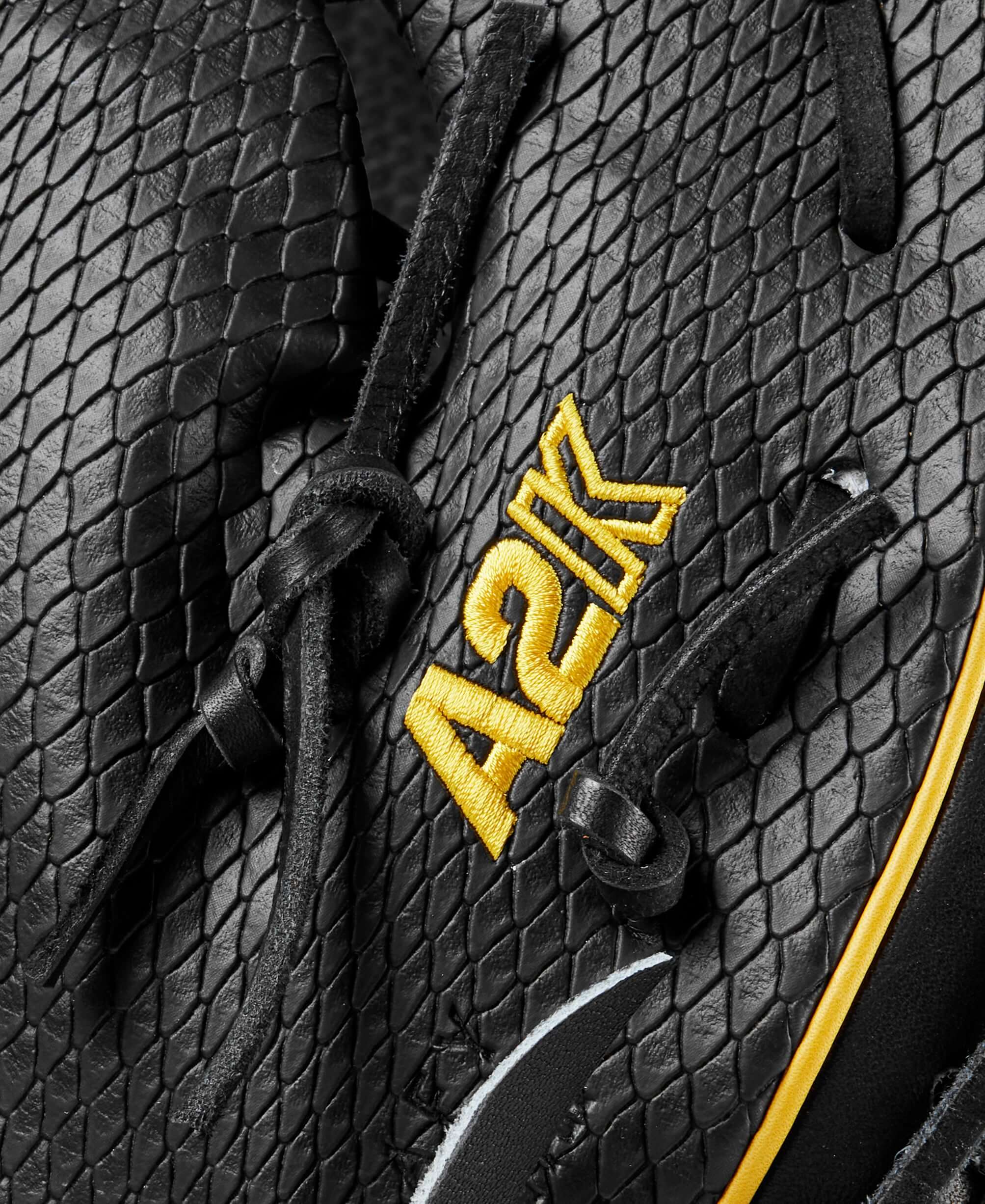 Close-up of the Wilson A2K first base mitt featuring unique black Pro Stock leather with A2K logo in yellow.