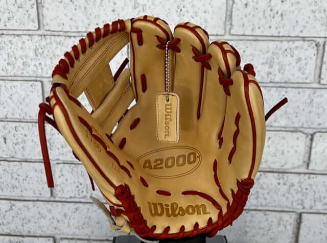 Wilson A2000 AZ Flag logo 1786 glove in Blonde leather with Saddle Tan laces, ideal for middle infielders.
