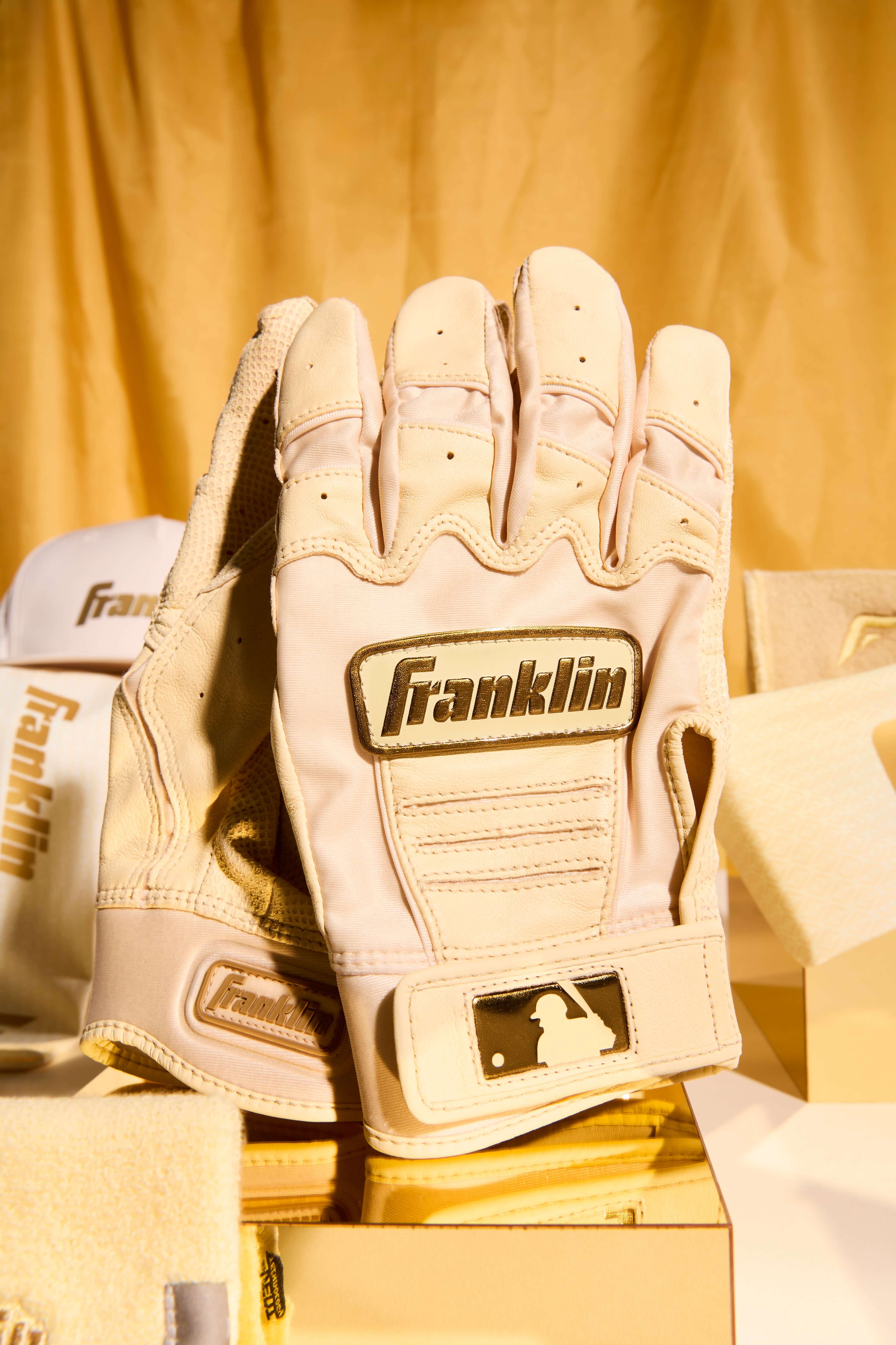 Franklin Adult CFX Pro Vanilla Gold Batting Gloves, official MLB gloves for enhanced batting performance.