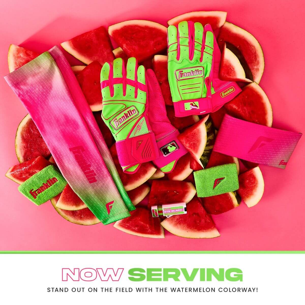 Franklin Youth CFX Pro Batting Gloves in Watermelon with accessories on a watermelon-themed background.