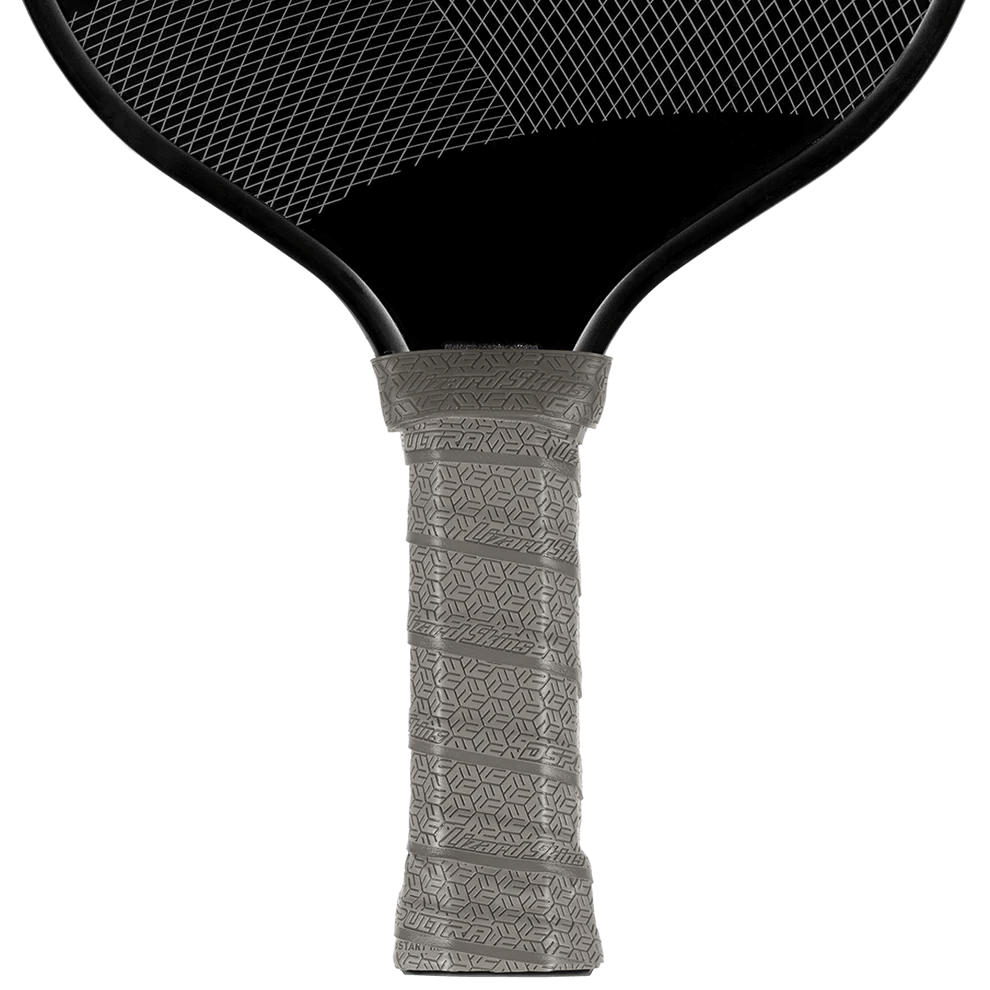 Lizard Skin DSP Ultra Pickleball Grip in graphite gray on a paddle, showcasing its texture and premium adhesive design.