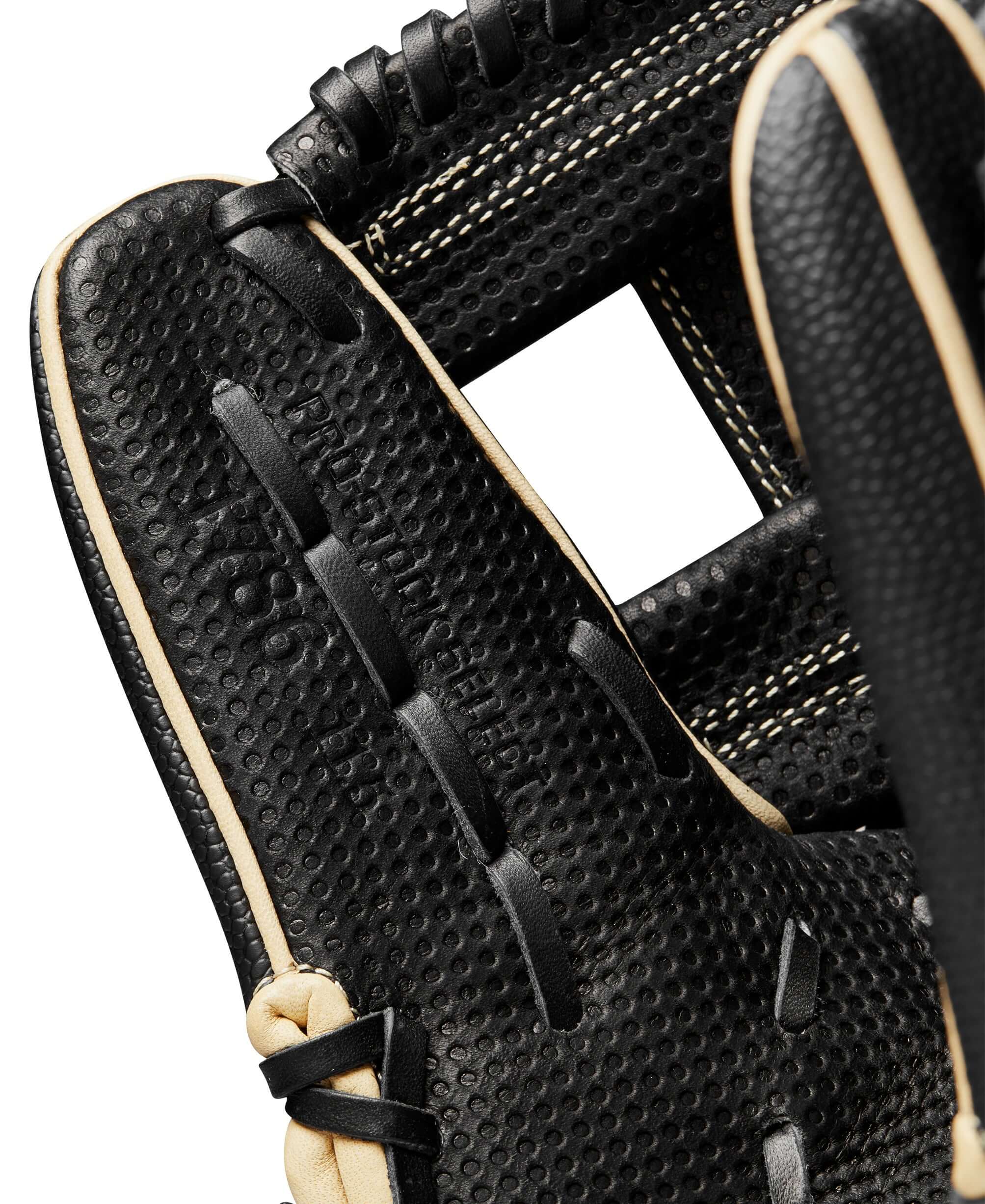 Close-up of Wilson 2024 A2K SC1786SS baseball glove's textured surface with Spin Control Technology and SuperSkin material.