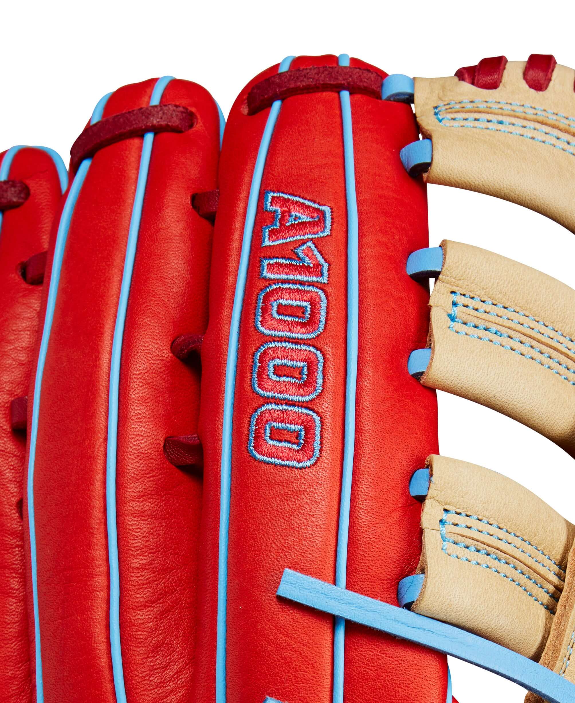 Close-up of the Wilson A1000 PF1892 outfield baseball glove showcasing red and blonde leather with A1000 detailing.