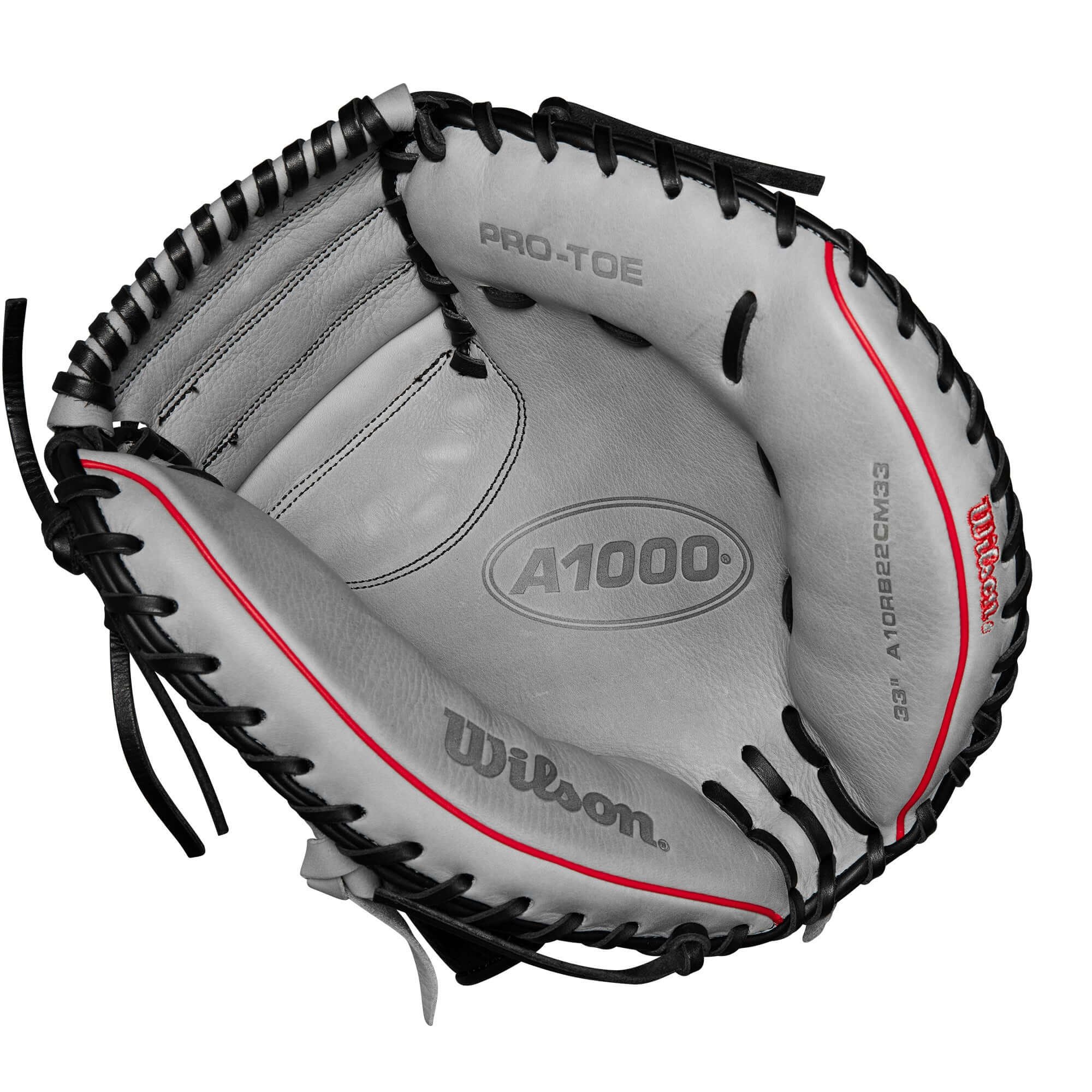 Inside view of Wilson 2024 A1000 CM33 catcher’s mitt in silver, black, and red, featuring Pro-Toe and DriLex lining.
