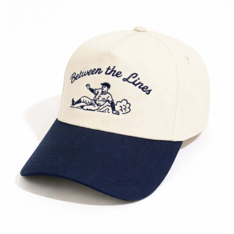 BTL Sliding Man Cream/Navy A-Frame Snapback with embroidered design and curved brim.
