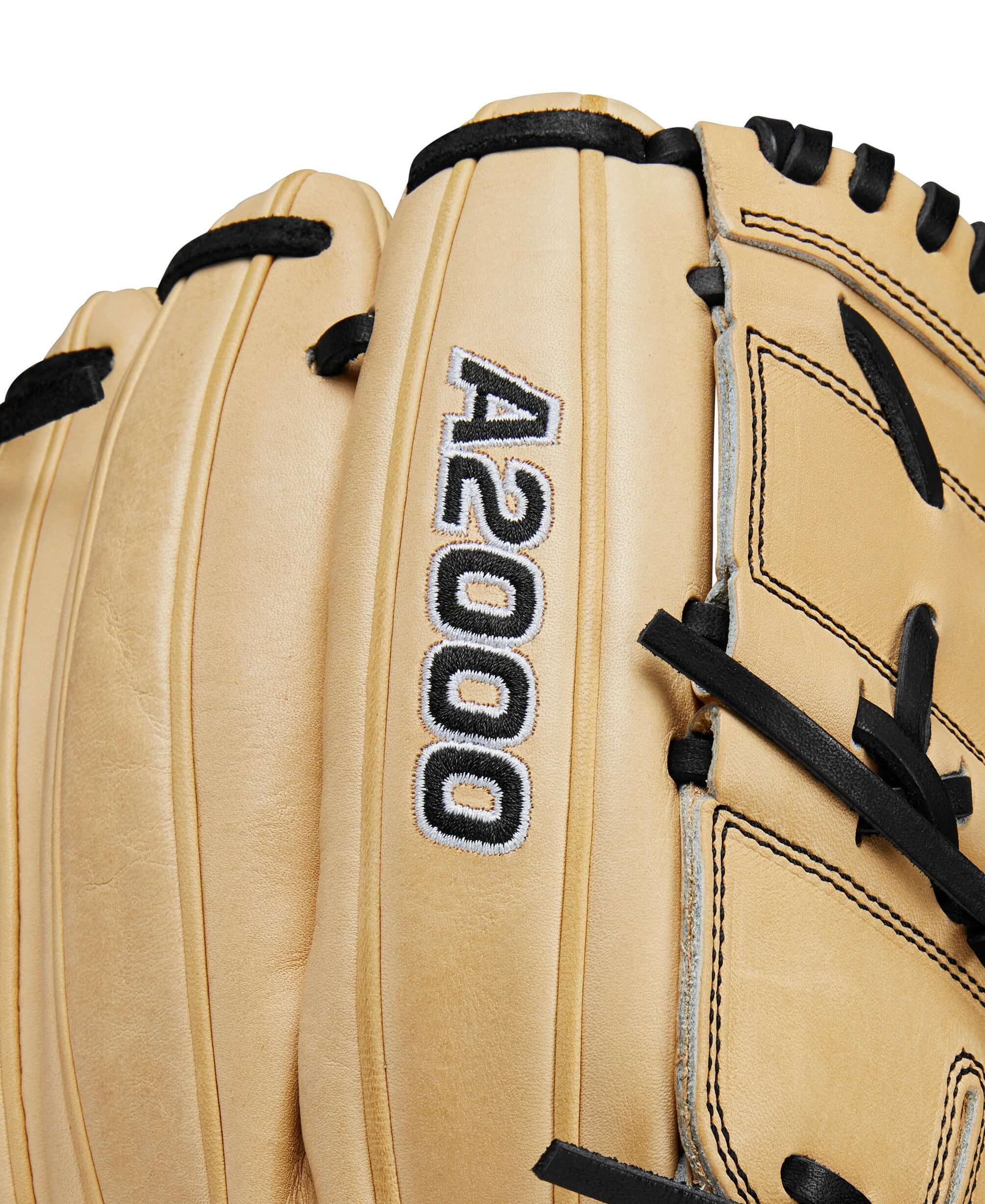 Close-up of the Wilson A2000 pitcher's glove showcasing its blonde Pro Stock® leather and detailed stitching.