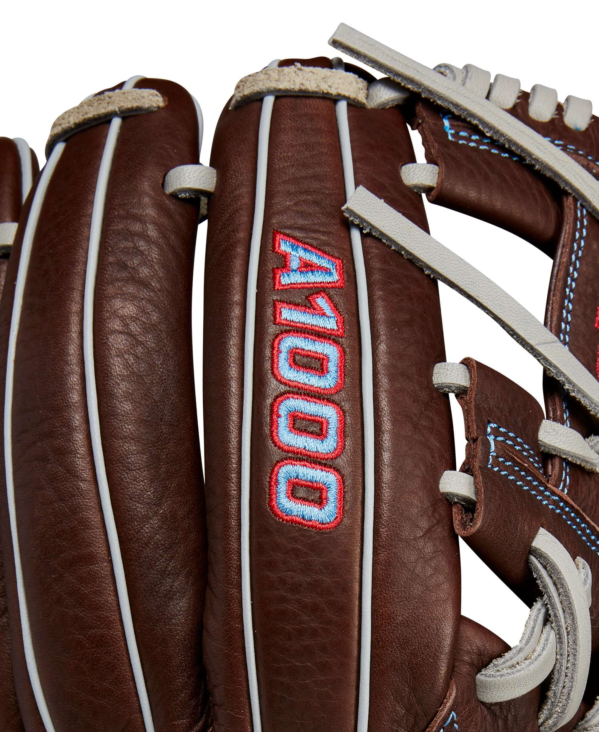 Close-up of Wilson A1000 1787 baseball glove showcasing dark brown leather and embroidered logo.