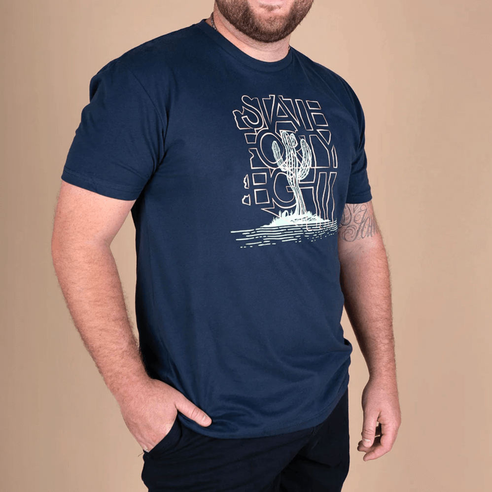 State Forty Eight Men's Crew Neck Saguaro Party Navy shirt featuring vibrant cactus graphic on a dark navy background.