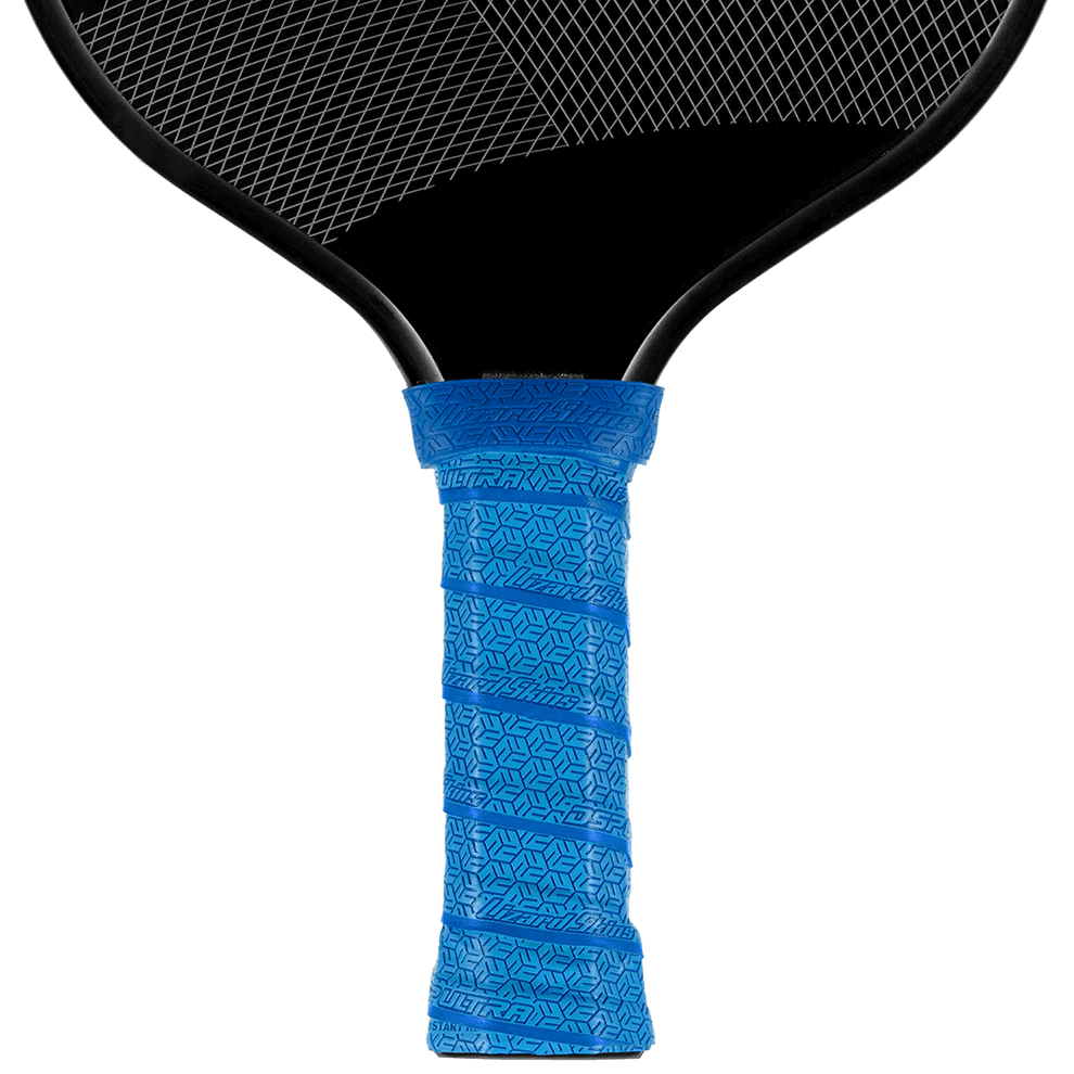 Lizard Skin DSP Ultra Pickleball Grip in Polar Blue installed on a pickleball paddle, showcasing its textured design and rubber finish.