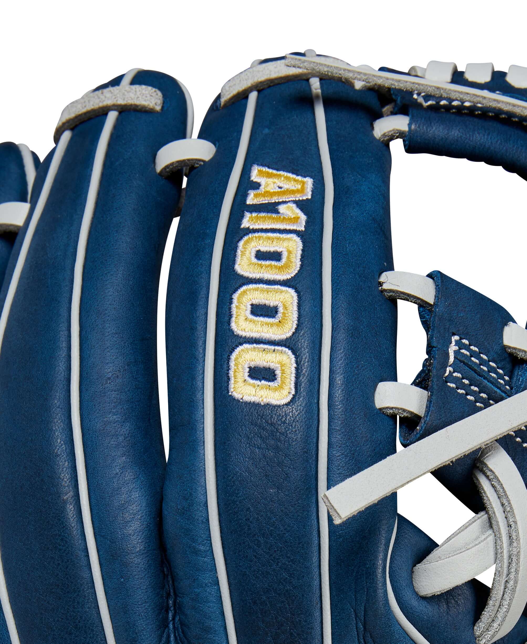 Close-up of Wilson A1000 baseball glove featuring Navy Full Grain Leather and yellow A1000 logo.