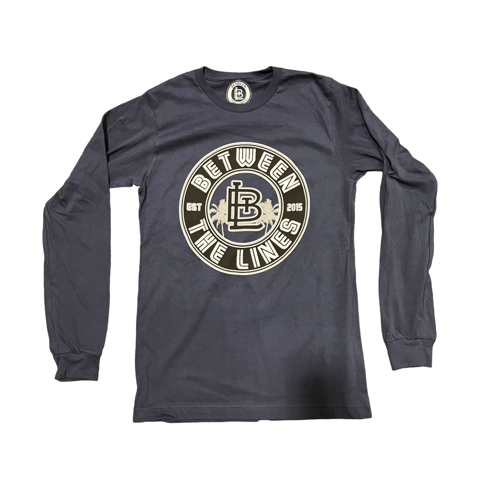 Long sleeve navy t-shirt featuring Between The Lines logo, ideal for casual outings and comfortable wear.