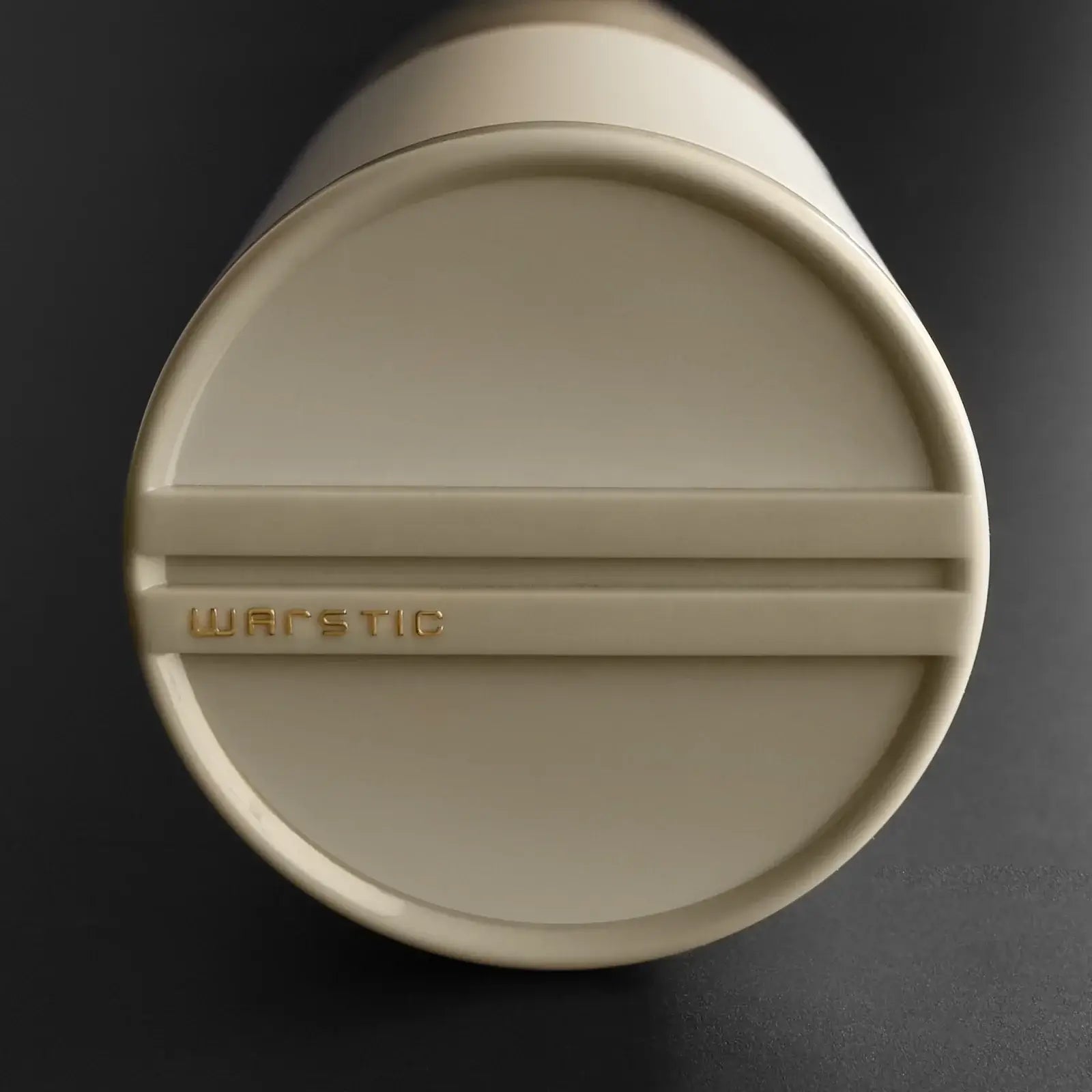 Bottom view of the Warstic Bonesaber baseball bat showcasing the brand logo and design details.