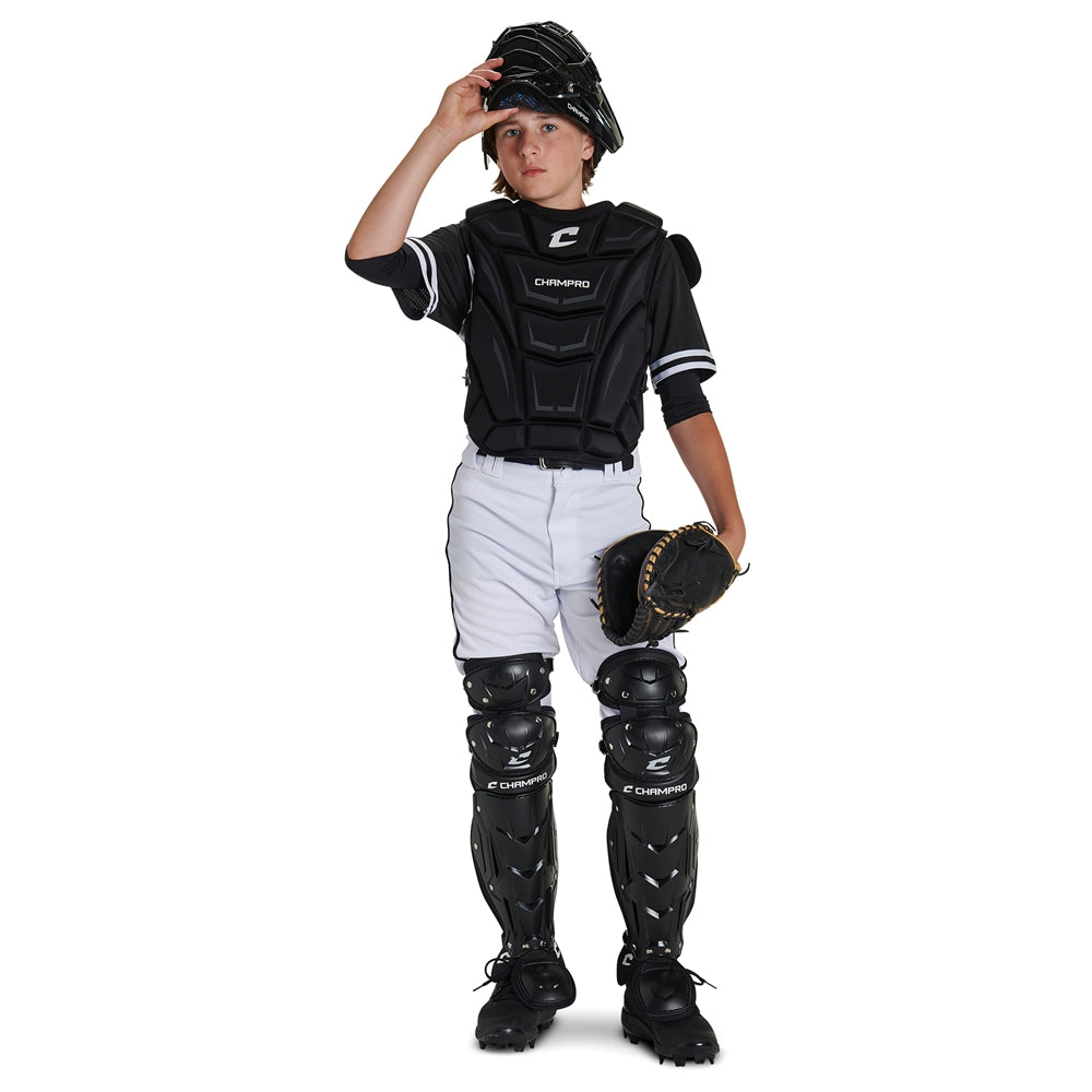 Young athlete wearing Champro Helmax 2.0 Youth Catcher's Set with helmet, chest protector, and leg guards.