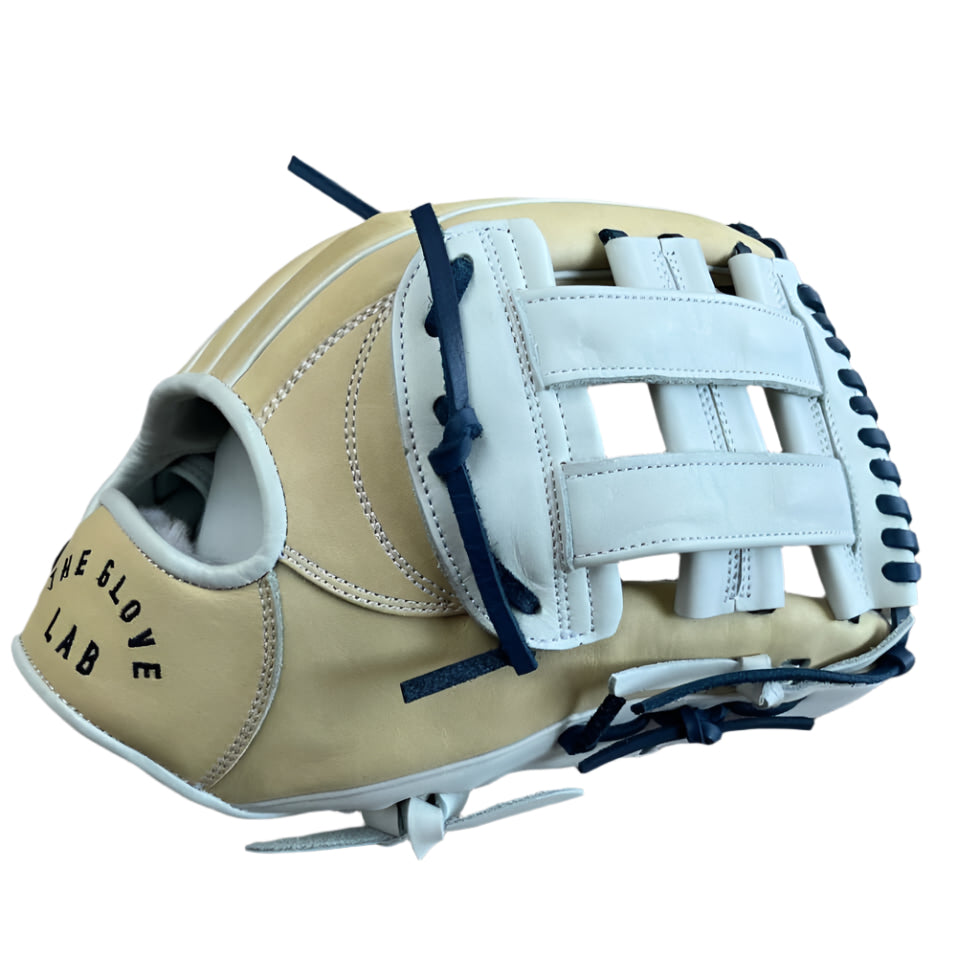 The Glove Lab 12.5" fast pitch fielders glove in beige and white, designed for optimal performance and comfort.