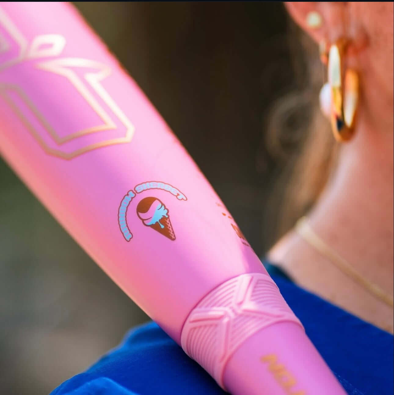 Close-up of the 2026 Easton Ghost OG Rainbow Sherbet (-10) Fastpitch Softball Bat with ice cream graphic on pink barrel.