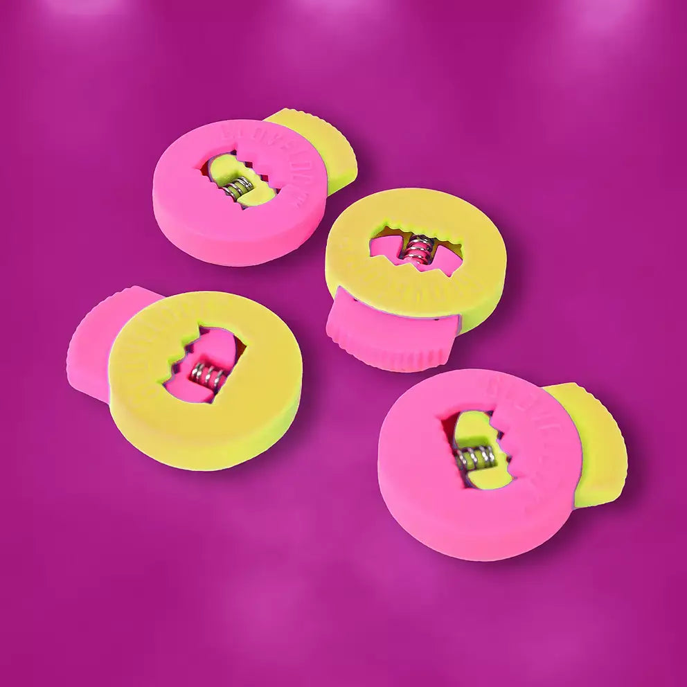 All-Star Glovelocks 4 Pack Lace Clips Limited Edition in pink and yellow on magenta background