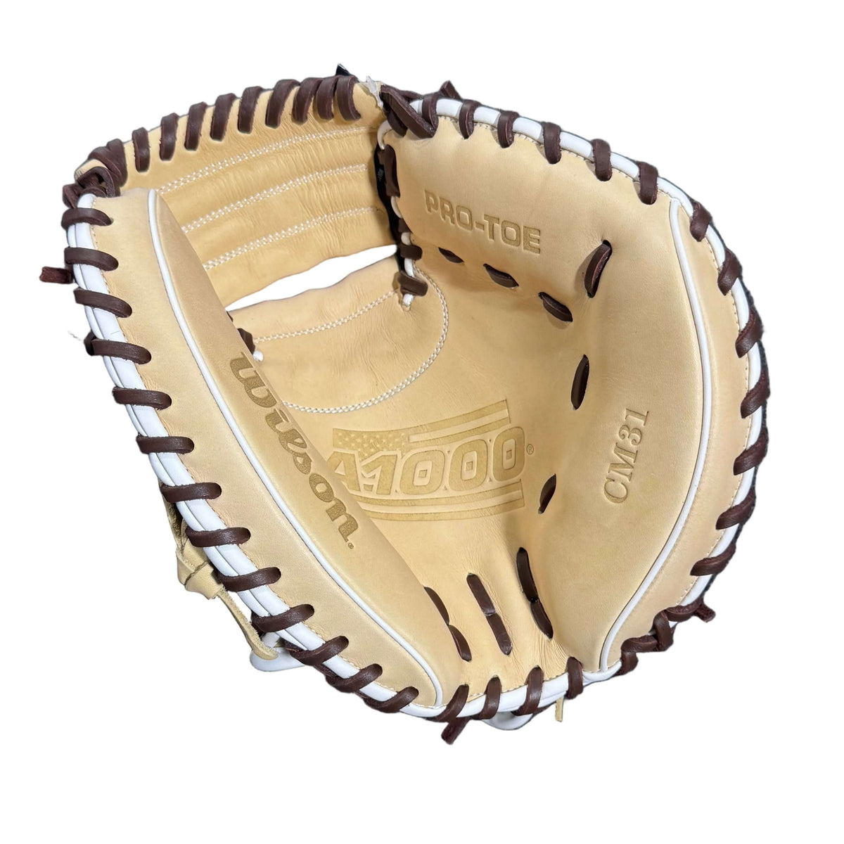 Wilson A1000 CM31 TRAINER Blonde/DkBrown/Wh 31 palm view, showing beige leather, dark brown lacing, and Pro-Tec stitching details.