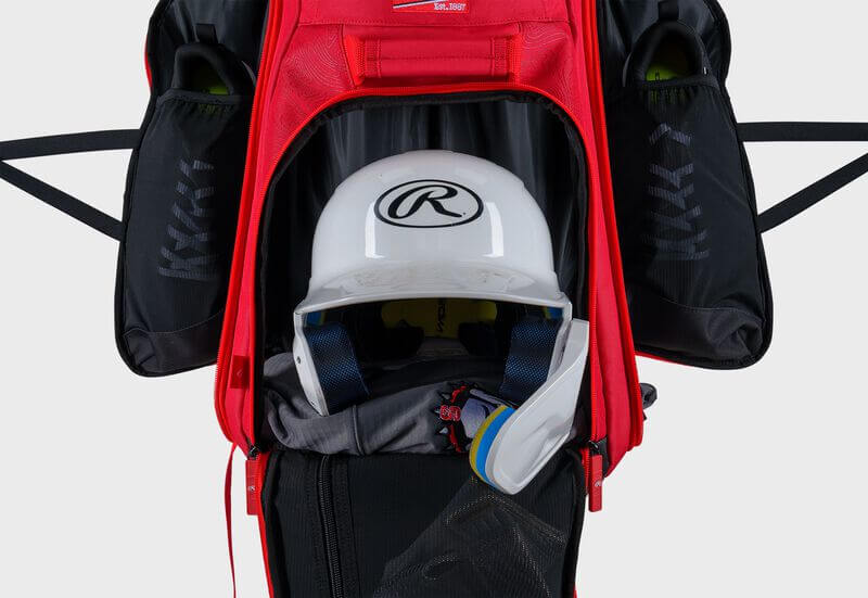Interior view of open Rawlings Legion 2 Players Backpack showing helmet compartment and gear storage.