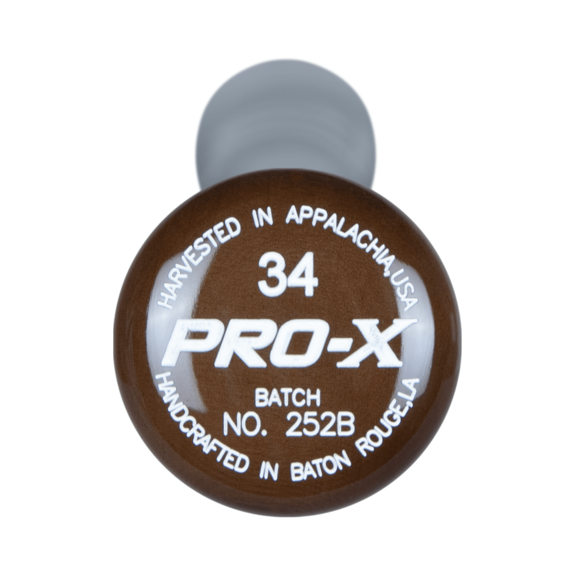 PRO-X maple wood bat knob showing "Harvested in Appalachia, USA" and batch number.