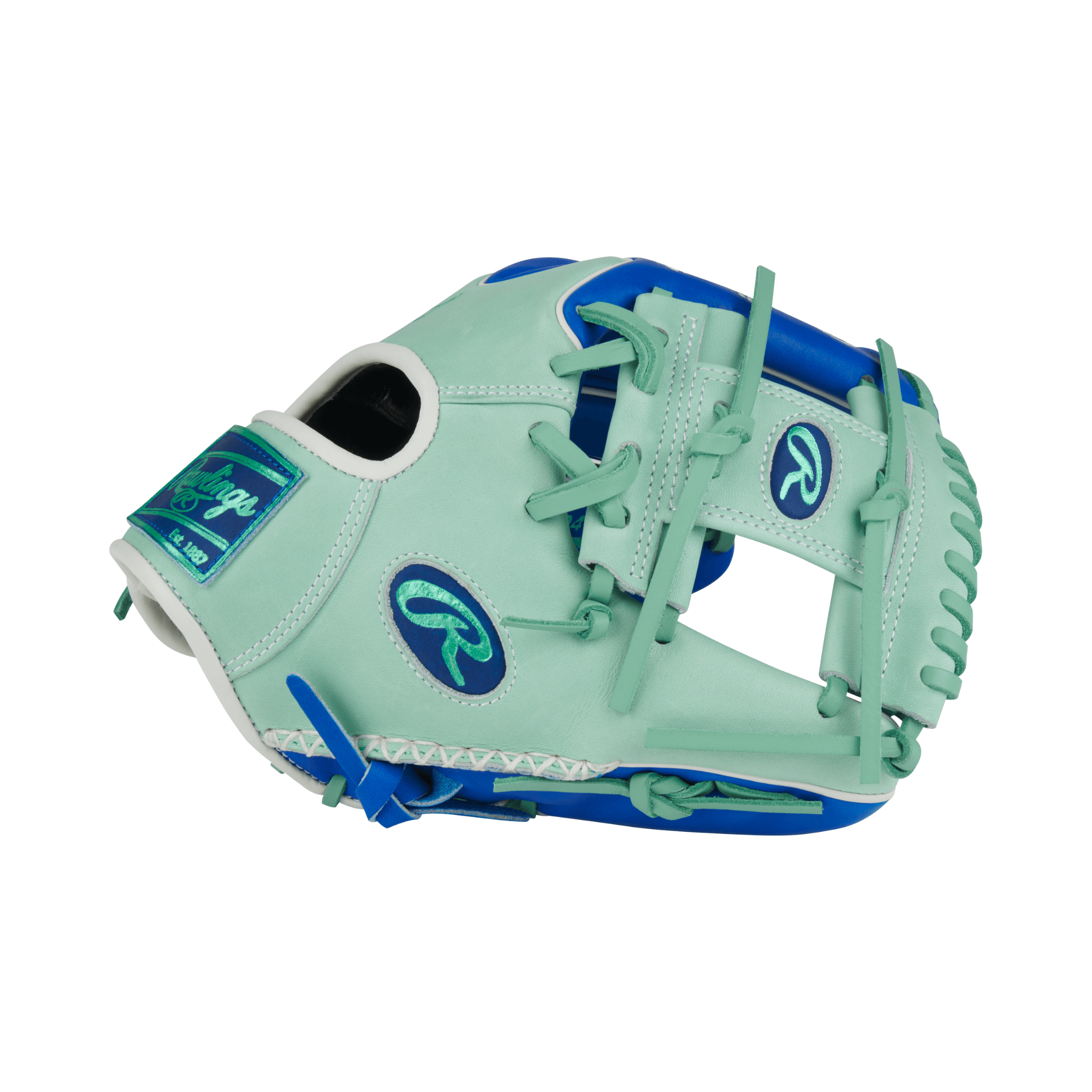 Close-up of thumb area on Rawlings Pro Preferred 11.5" Royal/Mint glove with padded thumb sleeve for comfort