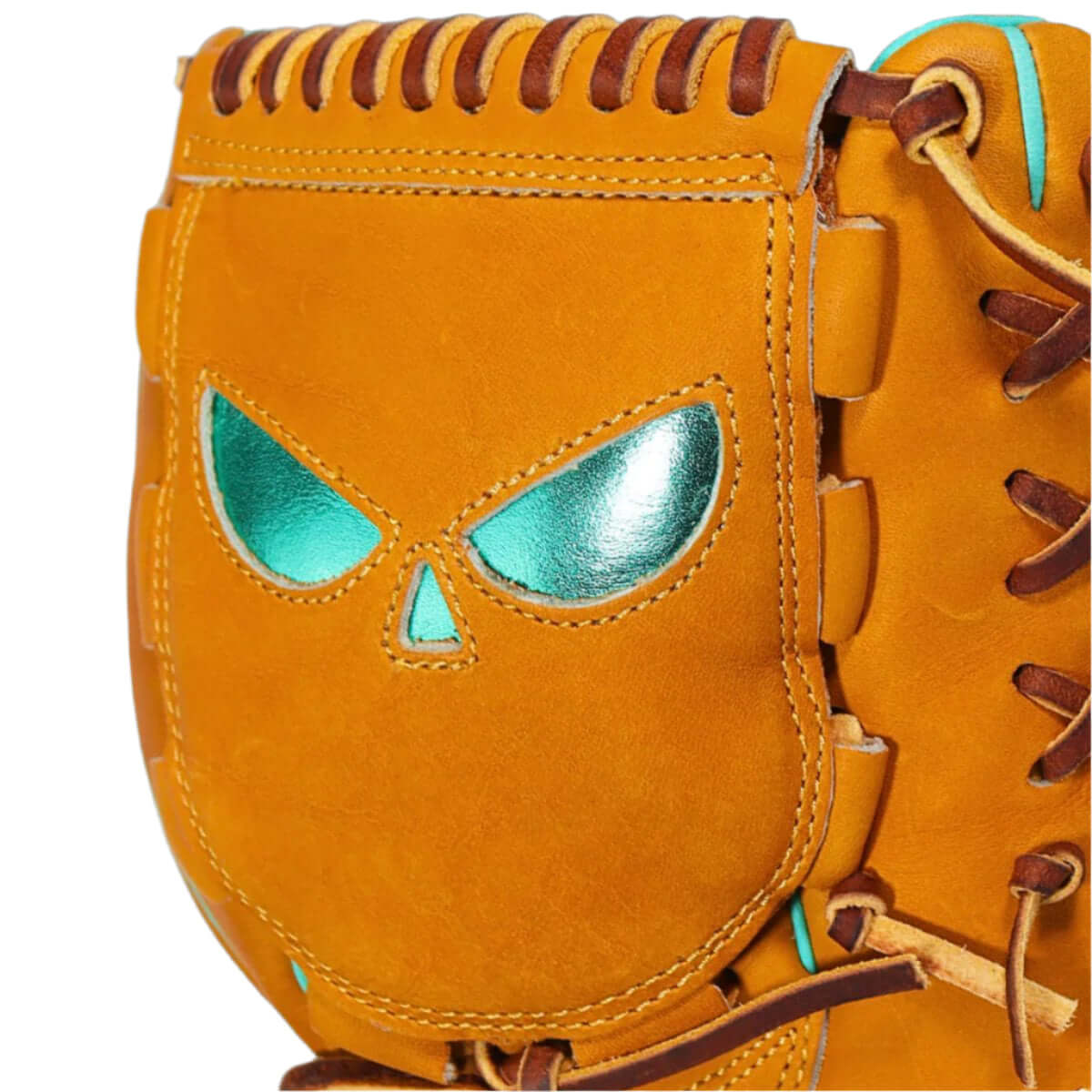 Close-up of Shadow 20: Sandstorm glove featuring teal inlays and a unique skull design.
