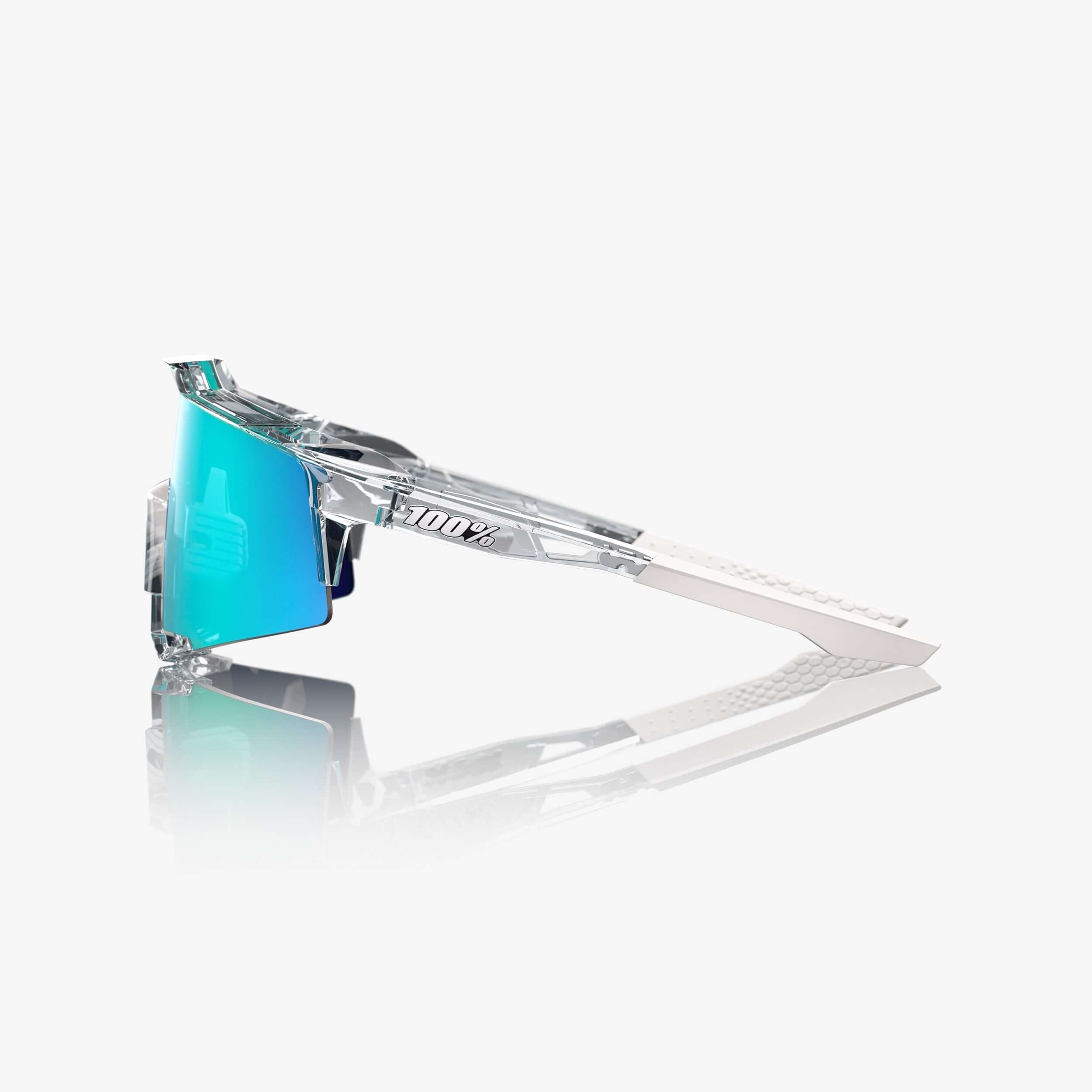 Side view of 100% Speedcraft Polished Clear sunglasses with ultra-grip tips and blue topaz mirror lenses for elite athletes