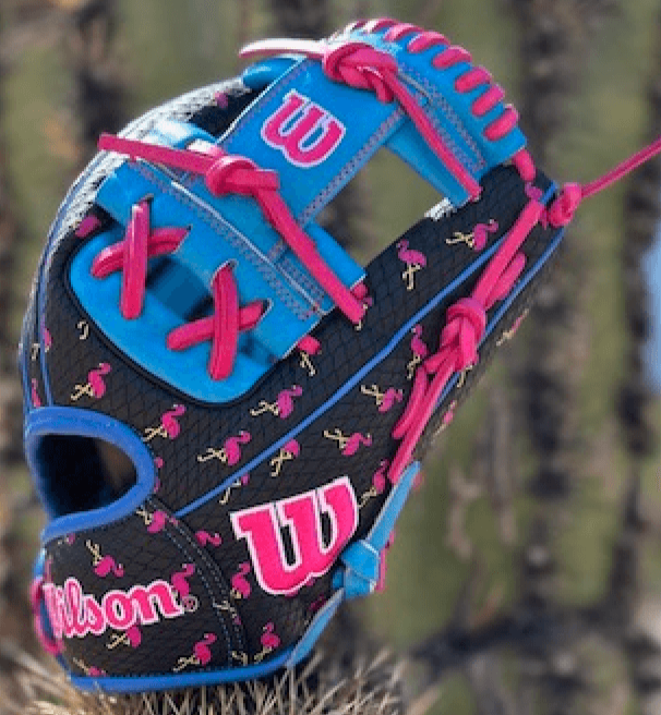 Wilson A2000 1786 KG Flamingo Trop baseball glove, featuring vibrant pink and blue design for top performance.