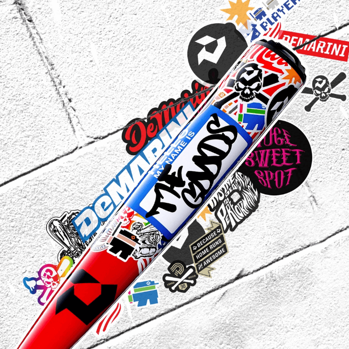 2026 DeMarini The Goods Sticker Bomb BBCOR Baseball Bat featuring bold graphics and a unique design on X14 Alloy Barrel.