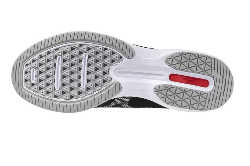 Mizuno Dominant4 Turf shoe outsole showcasing durable grip and innovative G3 sole design for enhanced performance.