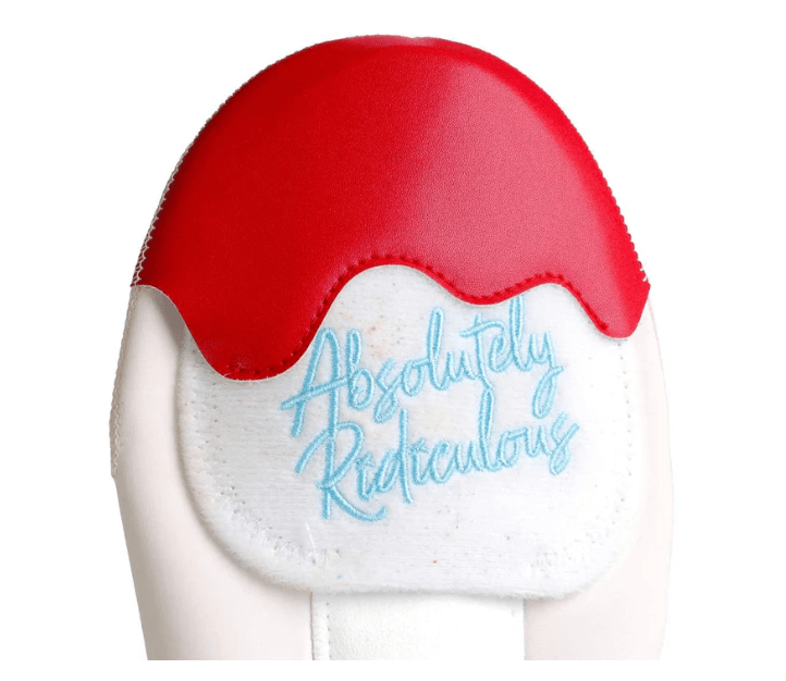 Close-up view of Absolutely Ridiculous Ice Cream Collection-Rocket Pop Sliding Mitt Youth showing red top and logo.