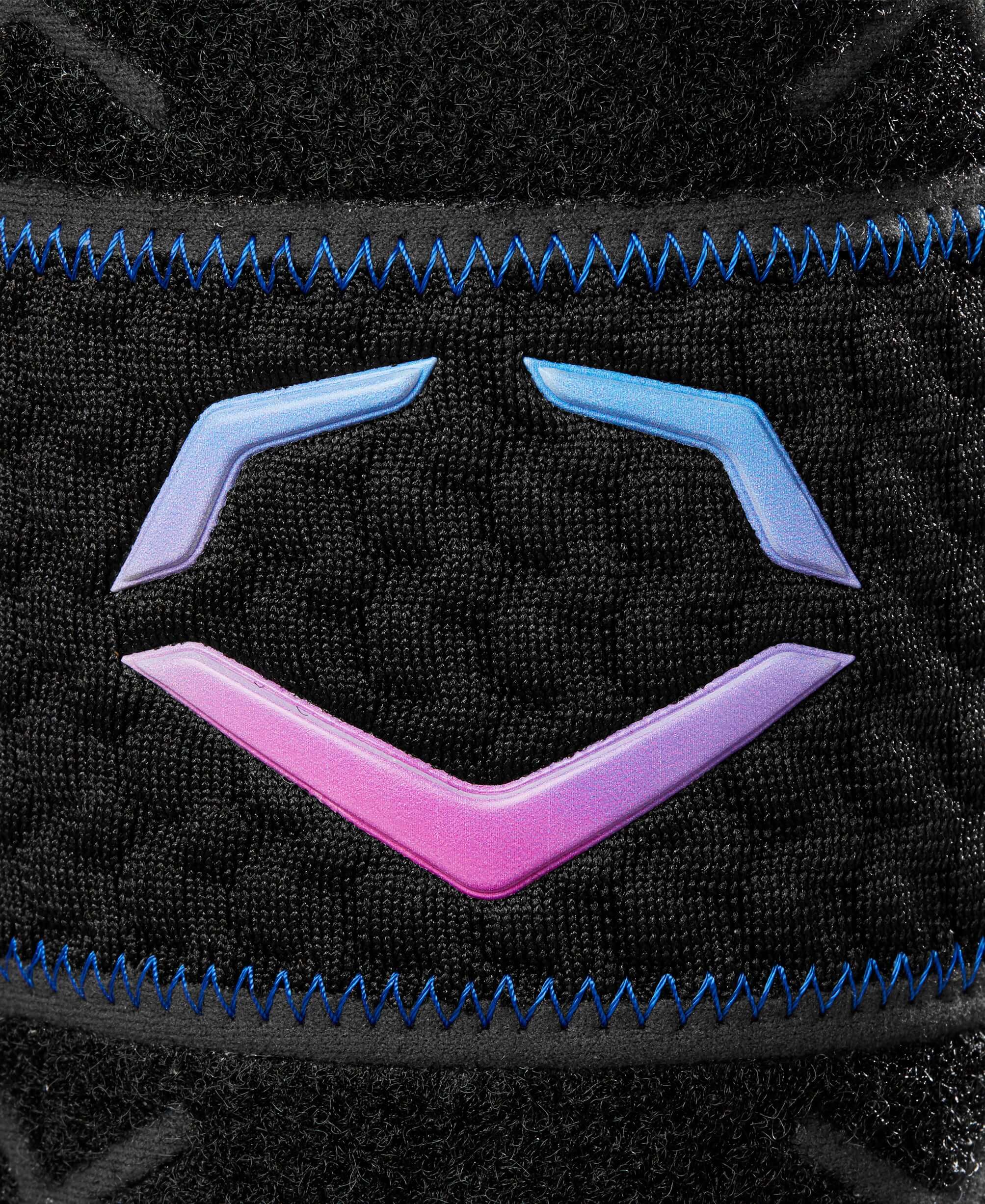 Close-up of the iridescent Evoshield logo on a black leg guard with detailed stitching.