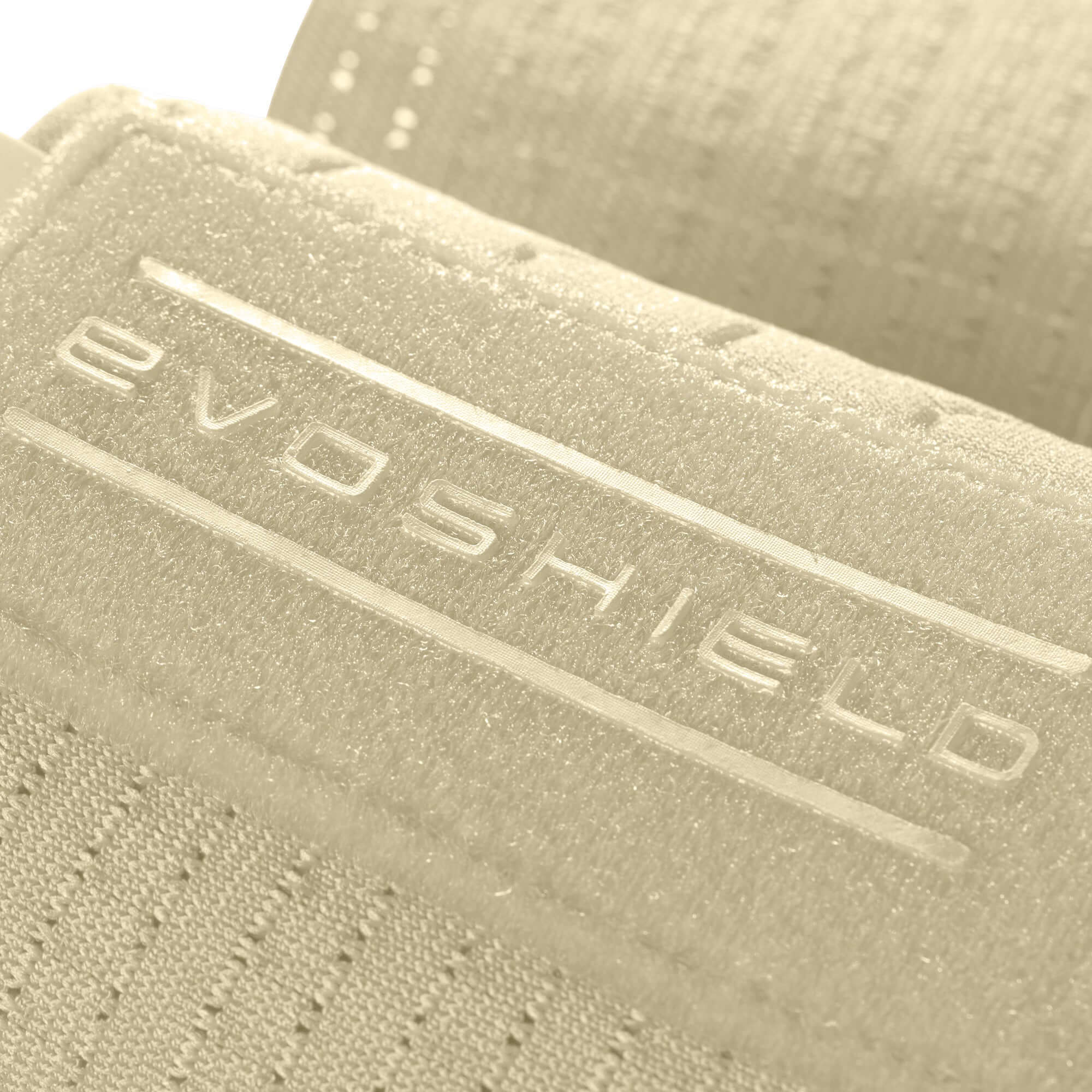 Close-up of EvoShield logo on Sliding Mitt 2.0, showcasing durable material and design features.
