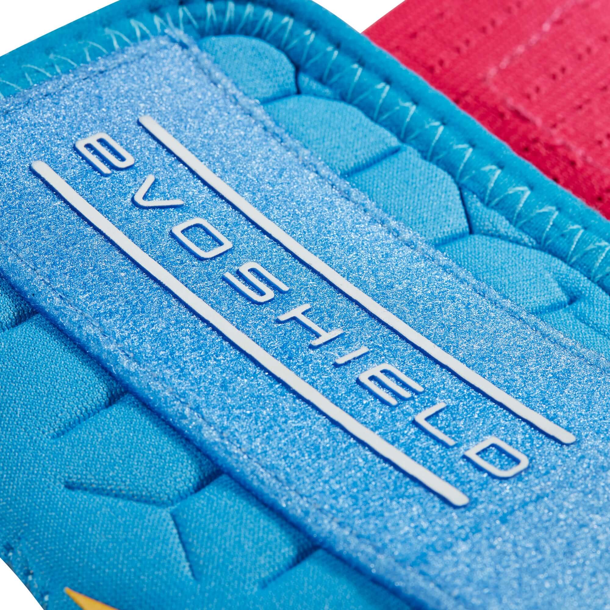 EvoShield X-SRZ Autism Speaks Sliding Mitt 2.0 showcasing vibrant Sky Blue and Pink gradient design.