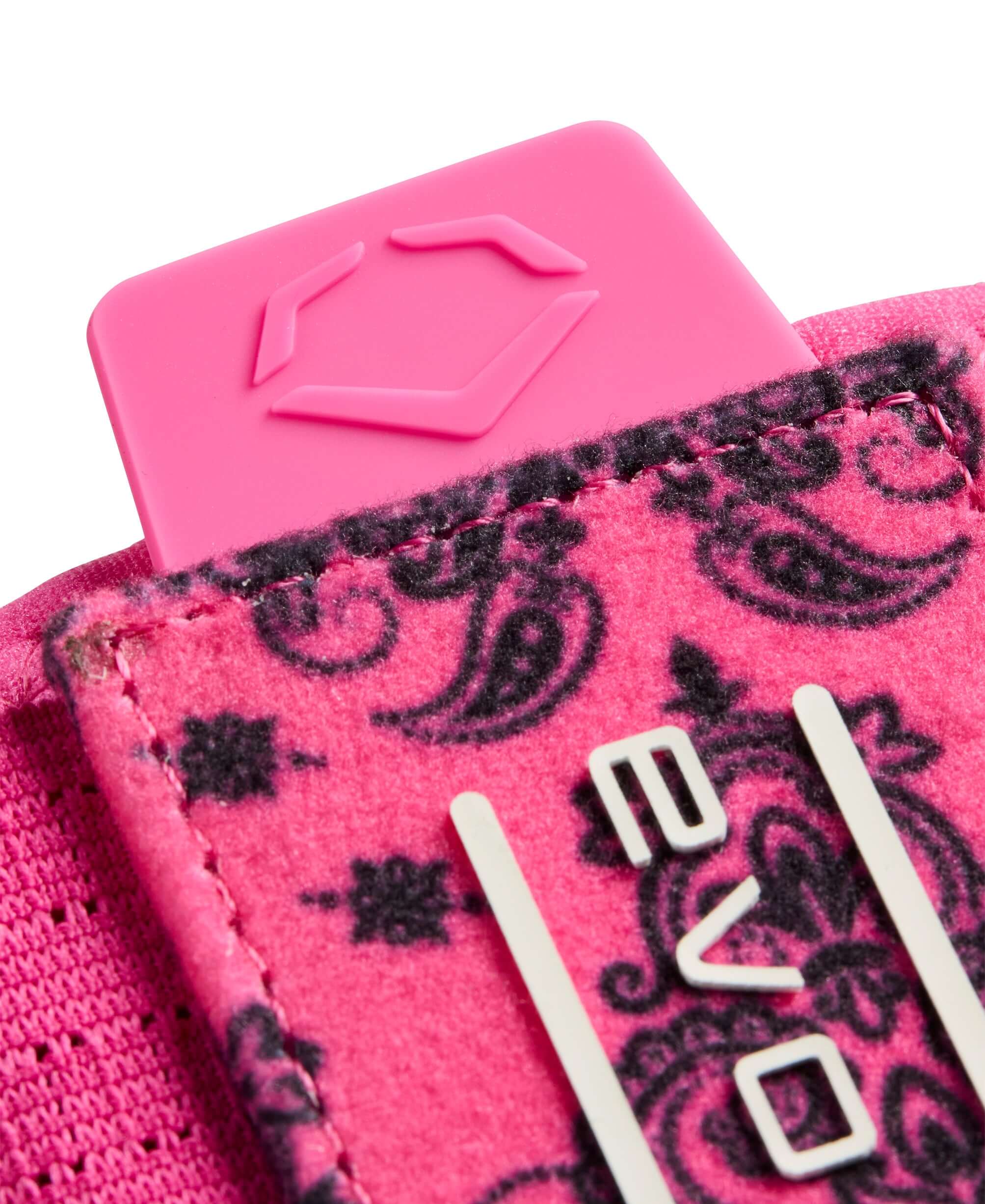 Close-up of Evoshield X-SRZ Paisley Sliding Mitt 2.0 in pink and black detailing, featuring branded logo and patterned fabric.