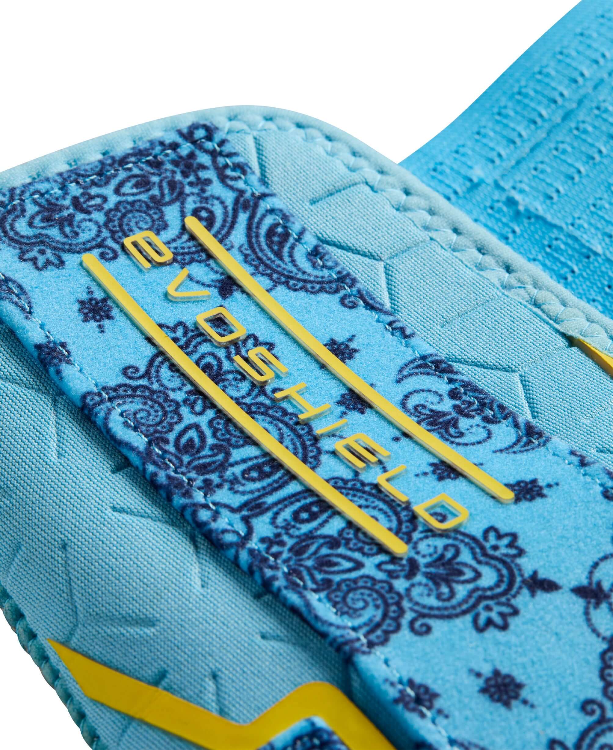Evoshield X-SRZ Paisley Sliding Mitt 2.0 in Victory Navy Volt design, featuring a vibrant blue and intricate paisley pattern.