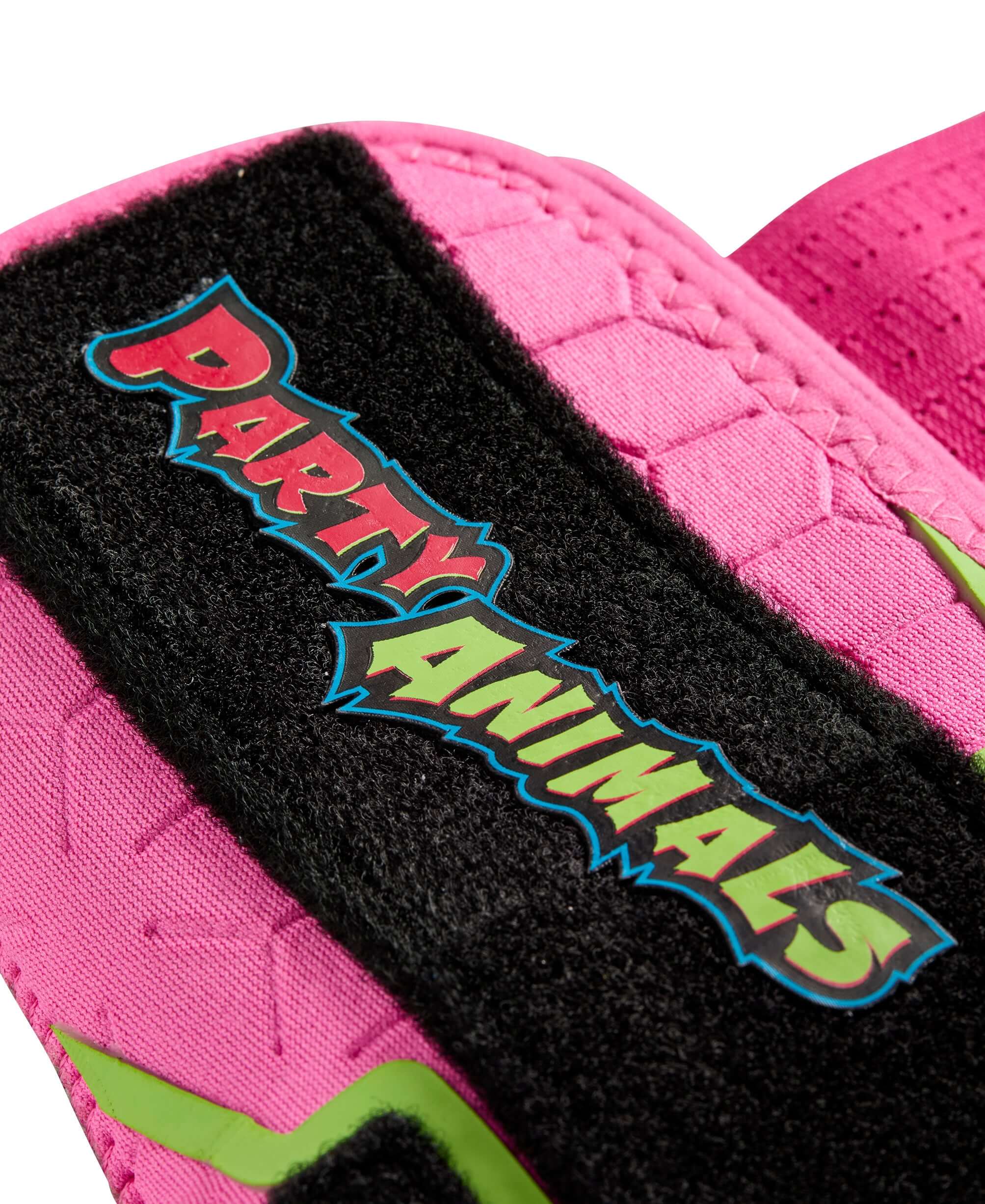 Close-up of the Evoshield Party Animals Sliding Mitt featuring bright pink and neon green accents.