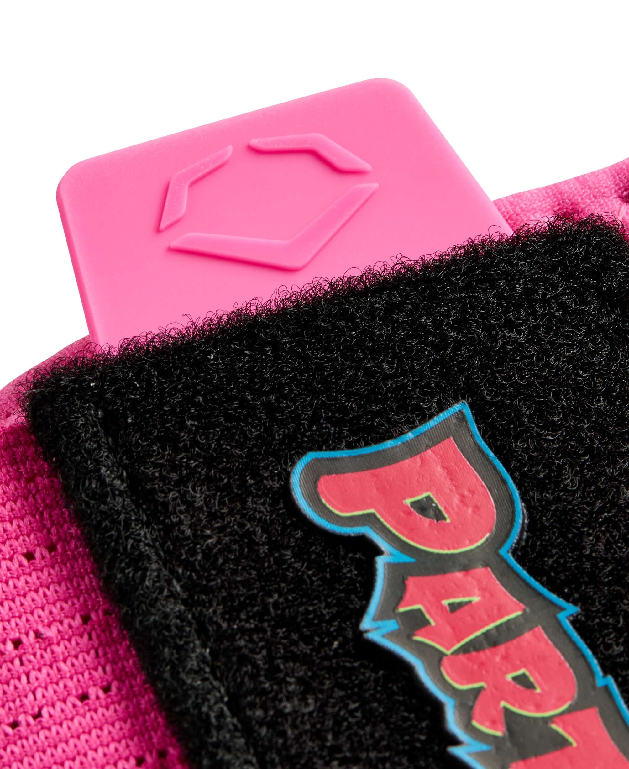 Close-up of the Evoshield Party Animals Sliding Mitt showing the pink strap and black logo detail.