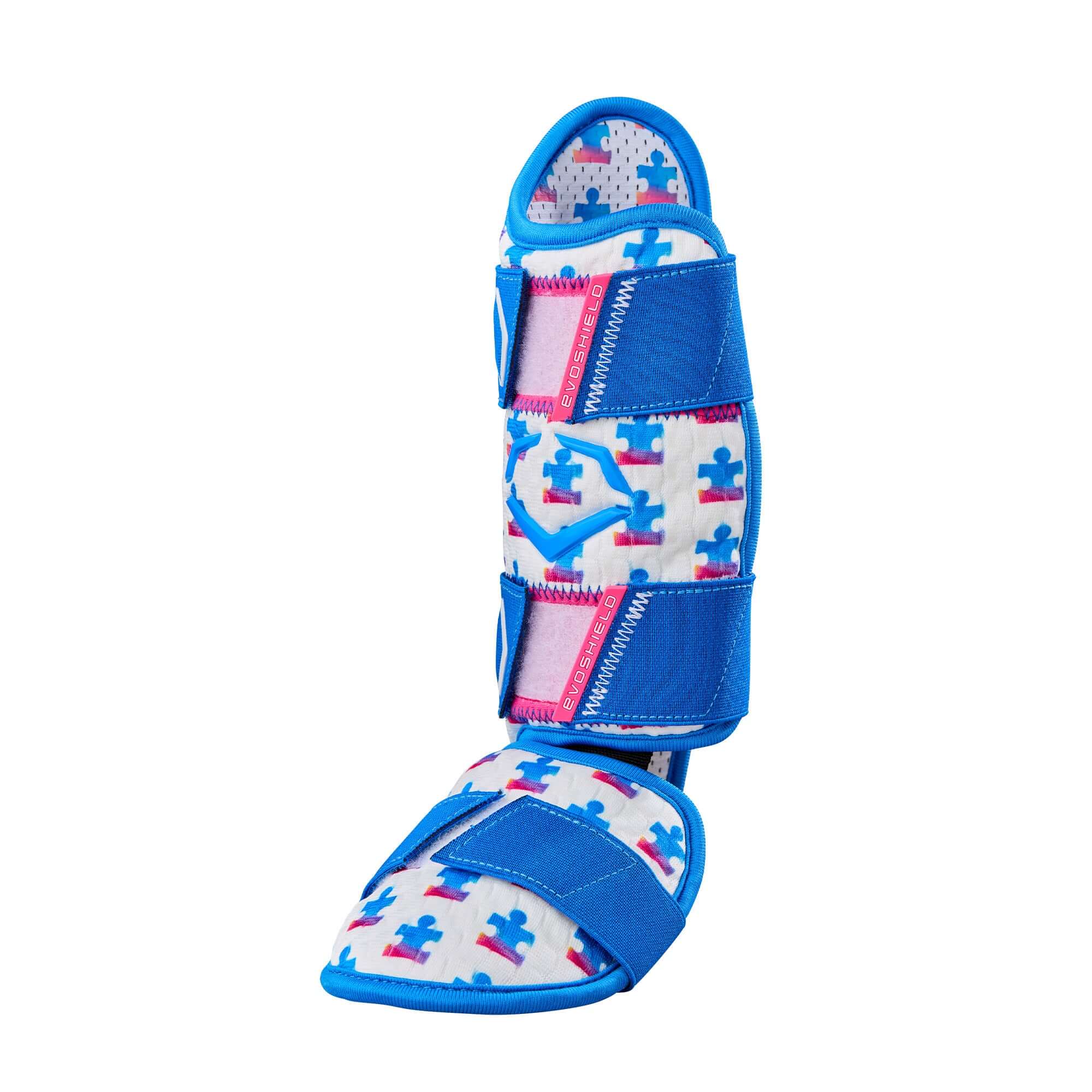 Evoshield X-SRZ Love the Moment Batter's Leg Guard in white, royal, and scarlet with puzzle pattern design.