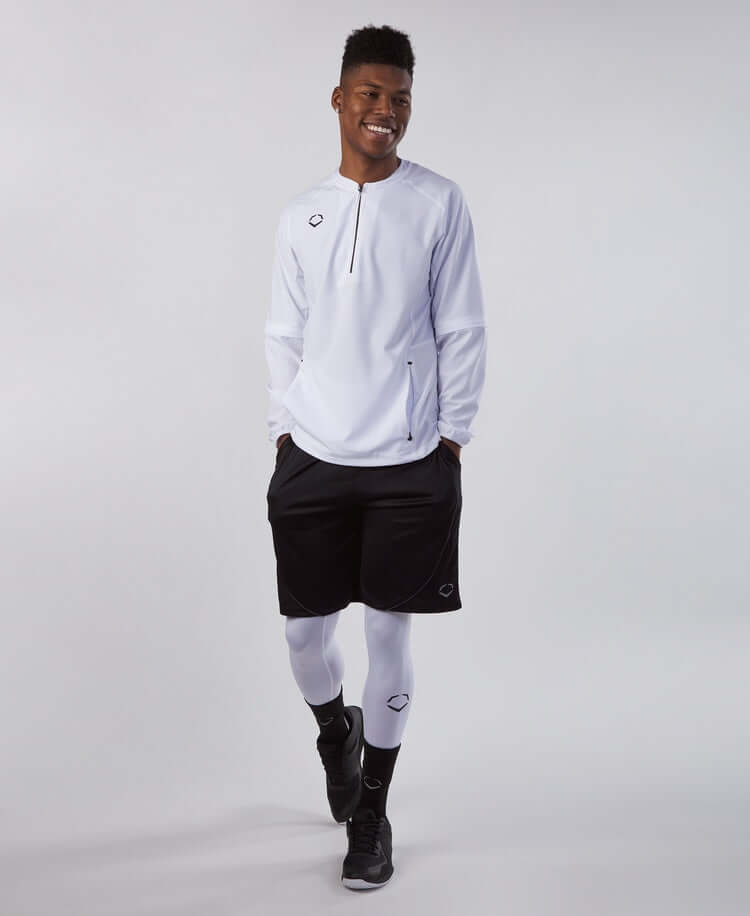 Evoshield Adult Long Sleeve BP Jacket in Team White, featuring removable sleeves and a relaxed fit, worn by a male model.