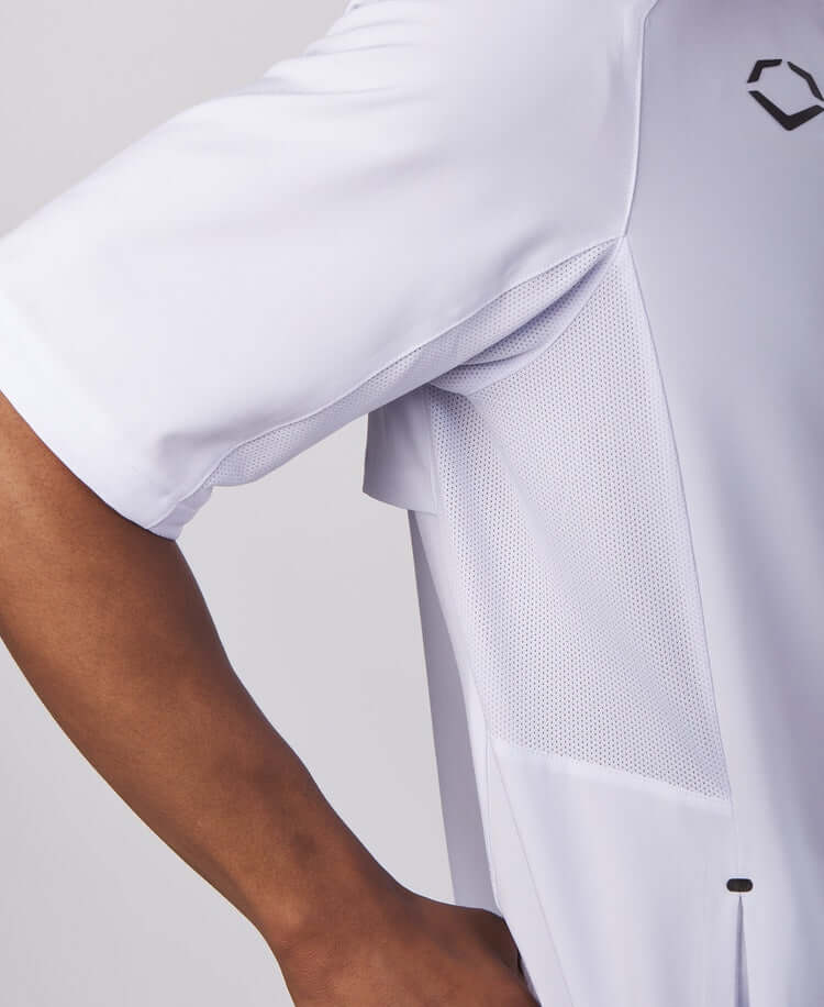 Close-up of Evoshield Adult Long Sleeve BP Jacket showing mesh inserts and relaxed fit design in Team White color.
