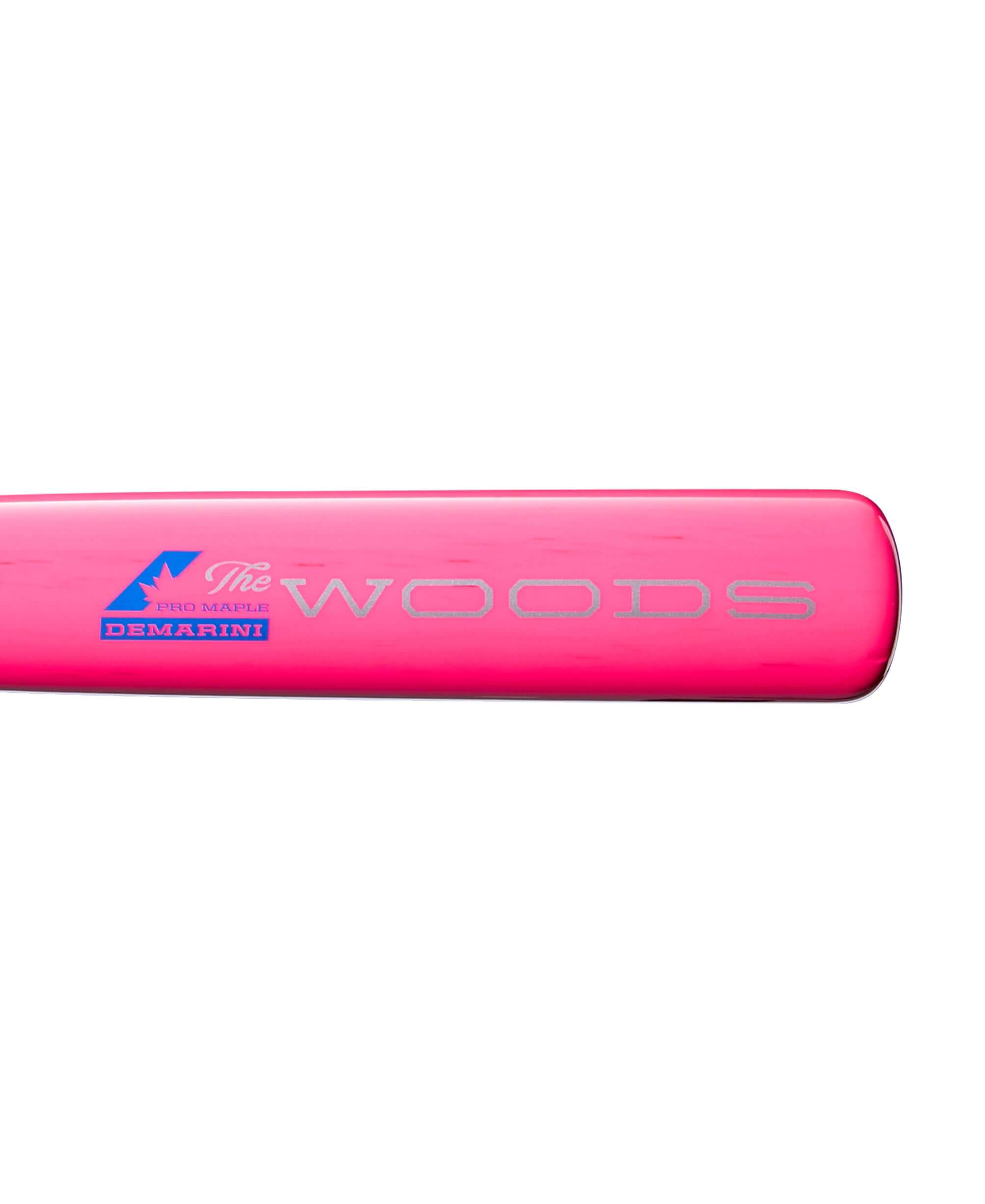 2026 DeMarini The Woods Pink Wood Composite BBCOR Bat showing glossy maple finish