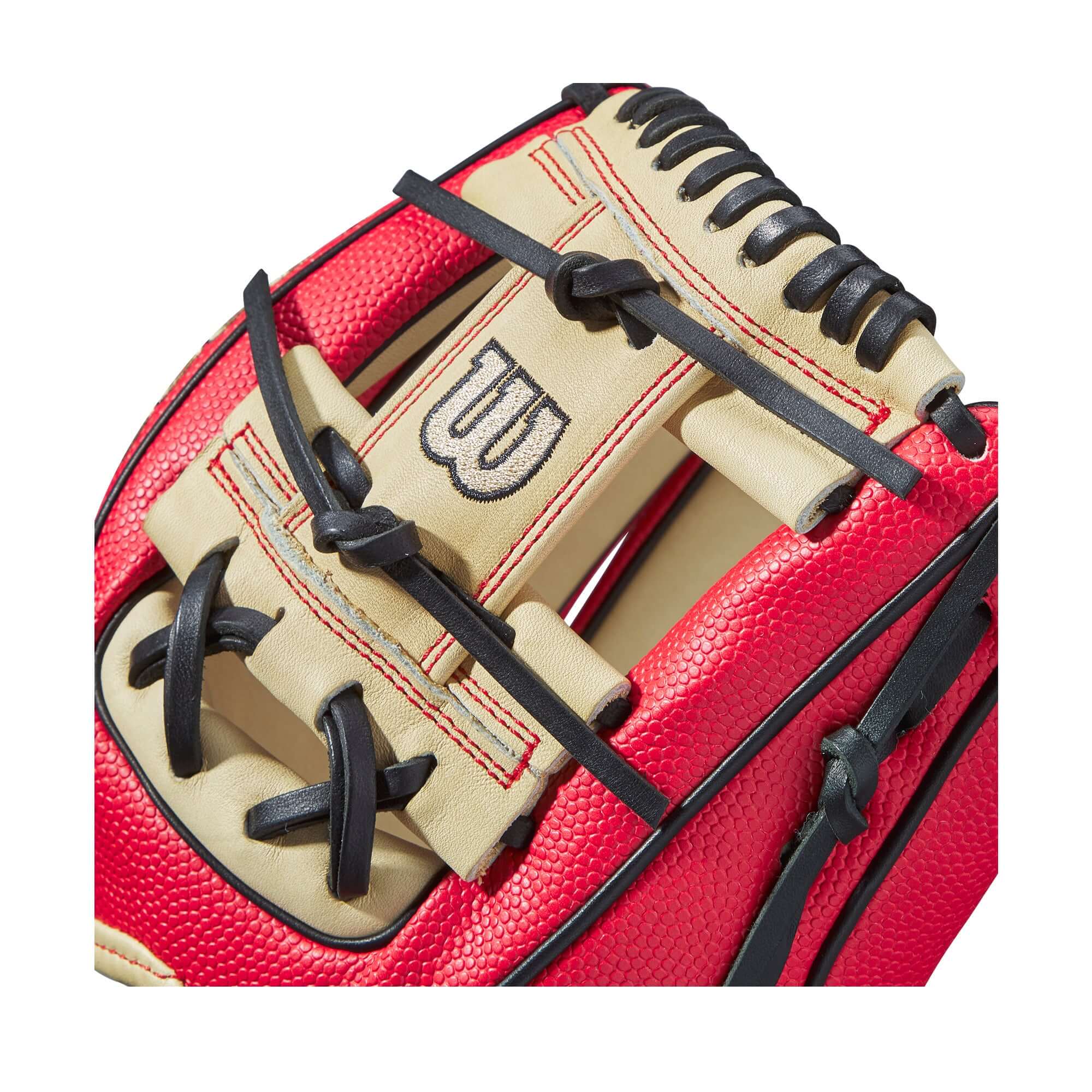 Close-up of Wilson A2000 1786 SS glove showing custom red and beige design with quality stitching.