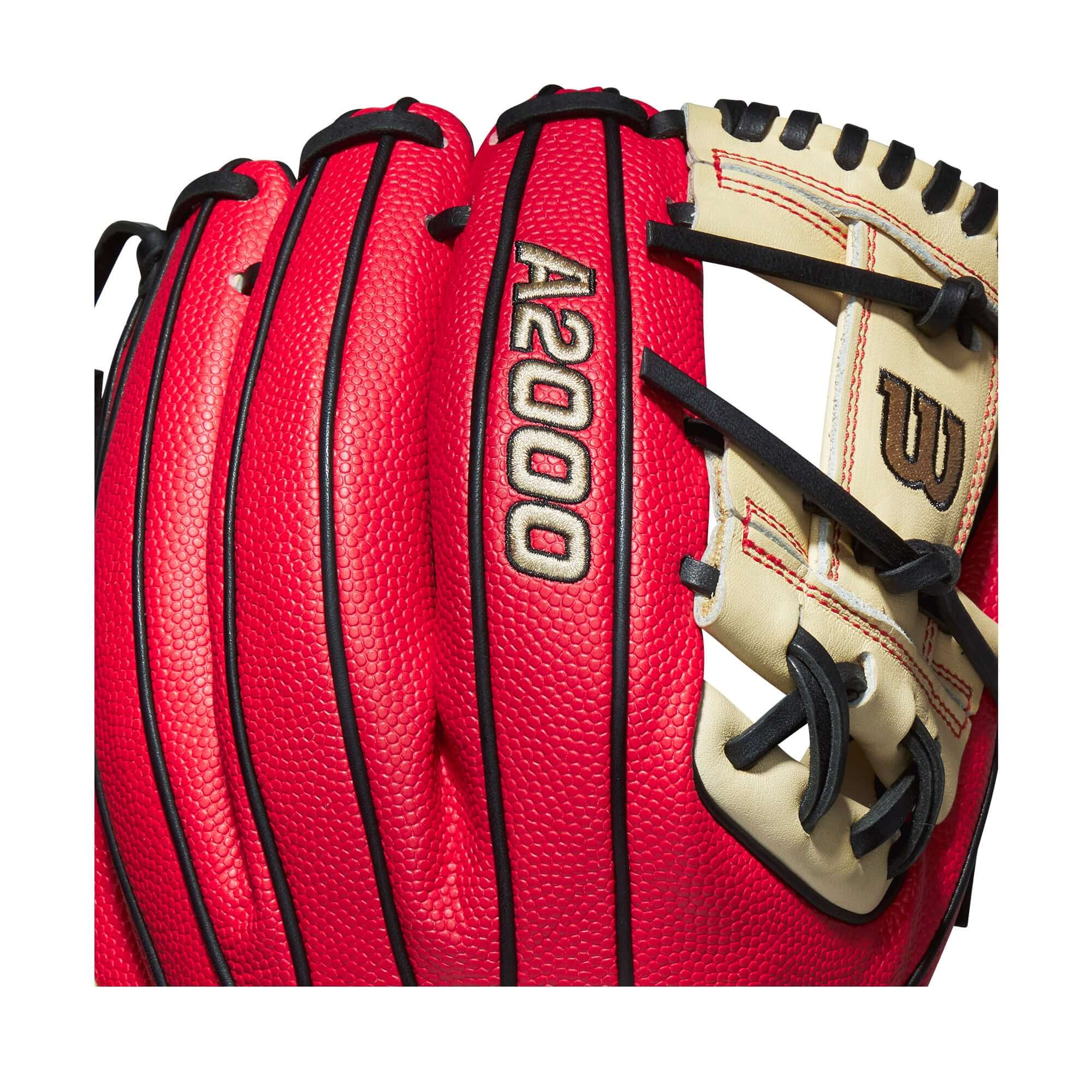 Wilson A2000 baseball glove in vibrant red and cream with secure fit and superior performance features.