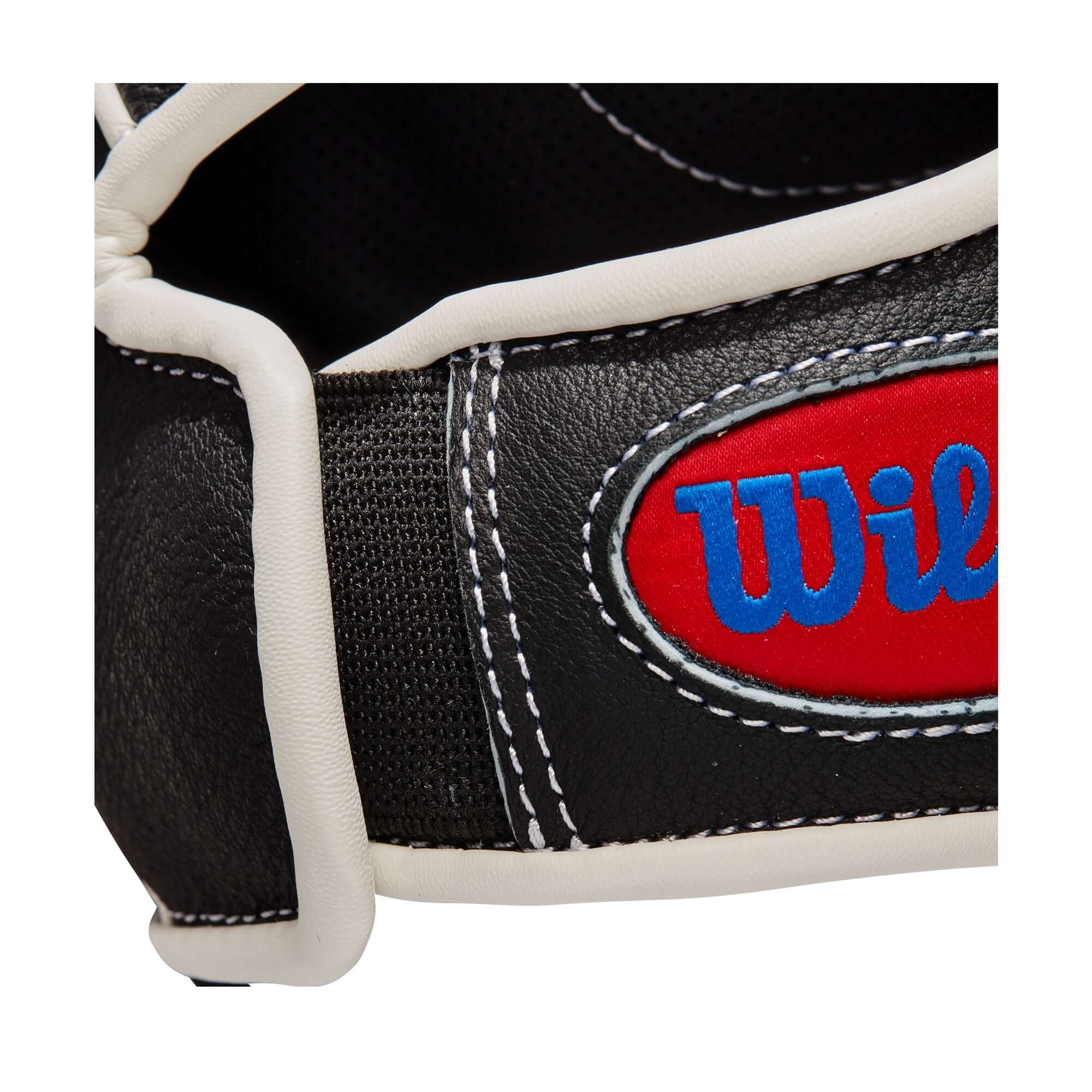 Wilson A450 12-inch Outfield Glove in Black and White with Dual Post Web, designed for young players.