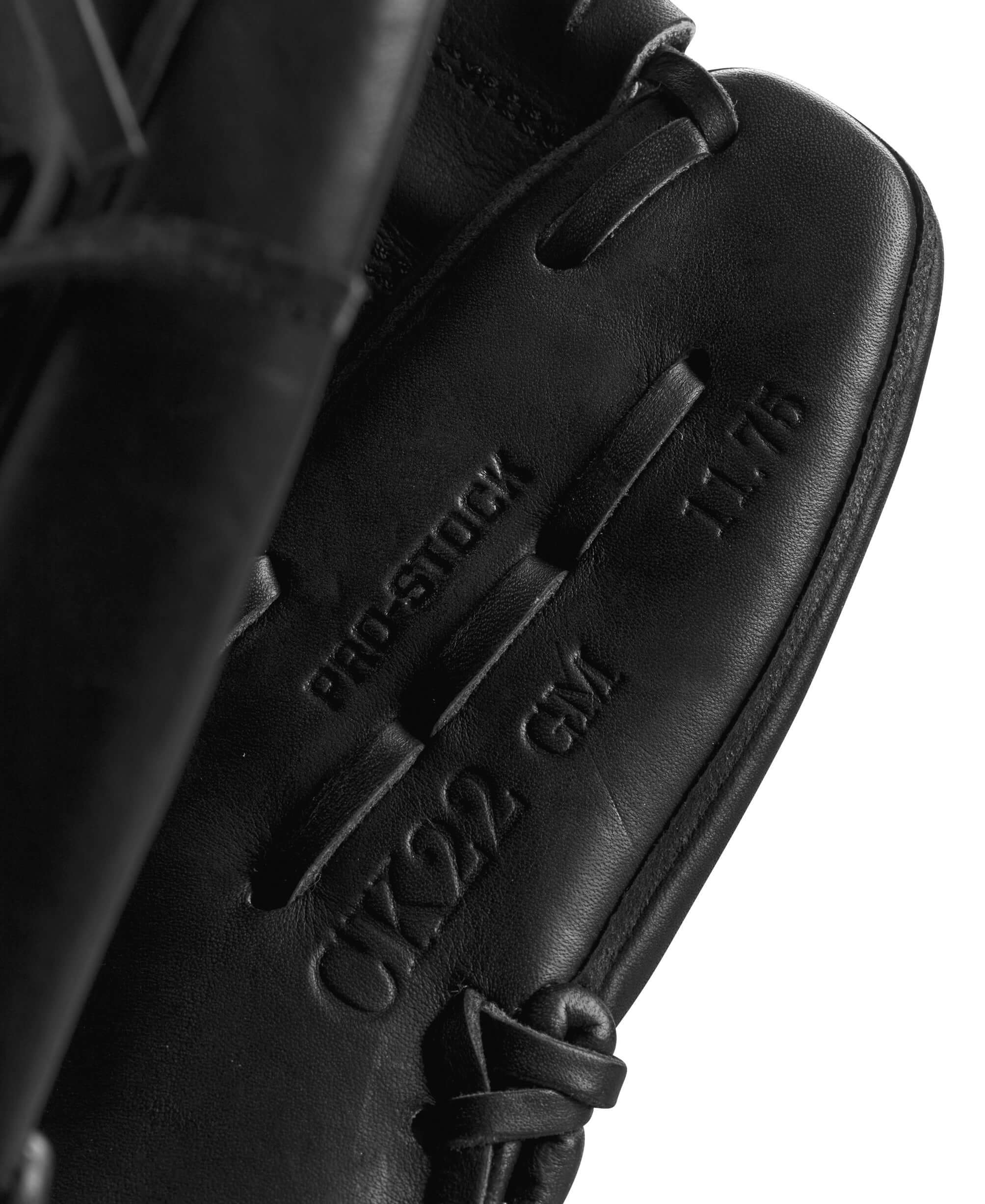 Close-up of Wilson A2000 CK22 glove, displaying Pro Stock leather and 11.75-inch size details for optimal performance.