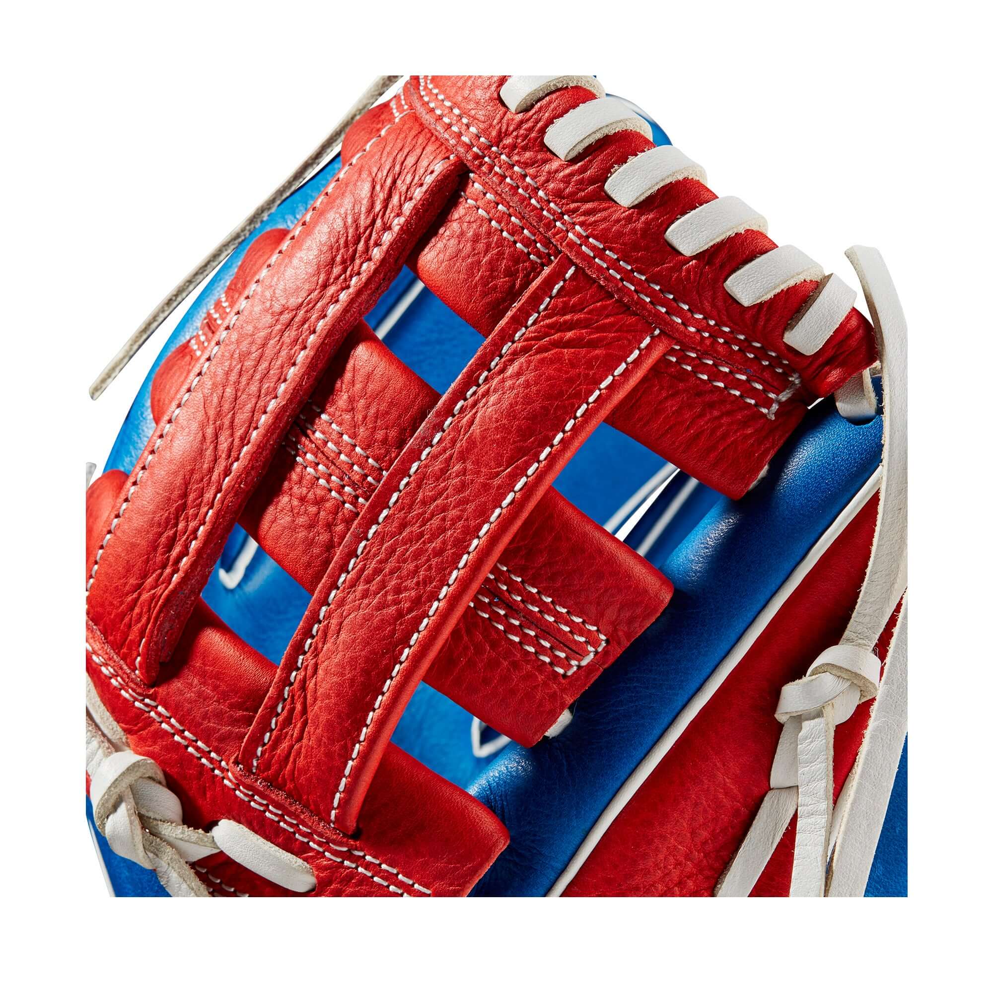 Close-up of the Wilson A1000 PF11 baseball glove showcasing its red leather design and durable laces.