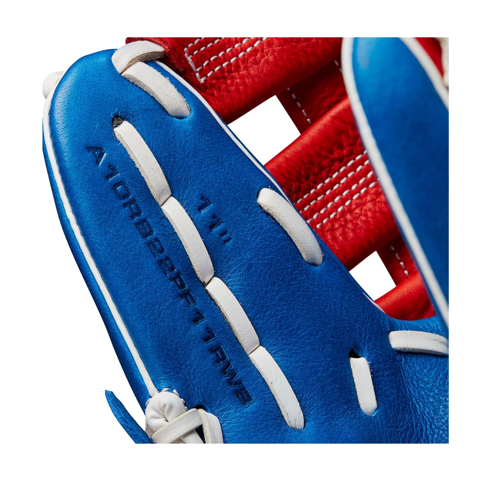 Close-up of Wilson A1000 PF11 infield baseball glove, highlighting the blue and red leather design with size details.