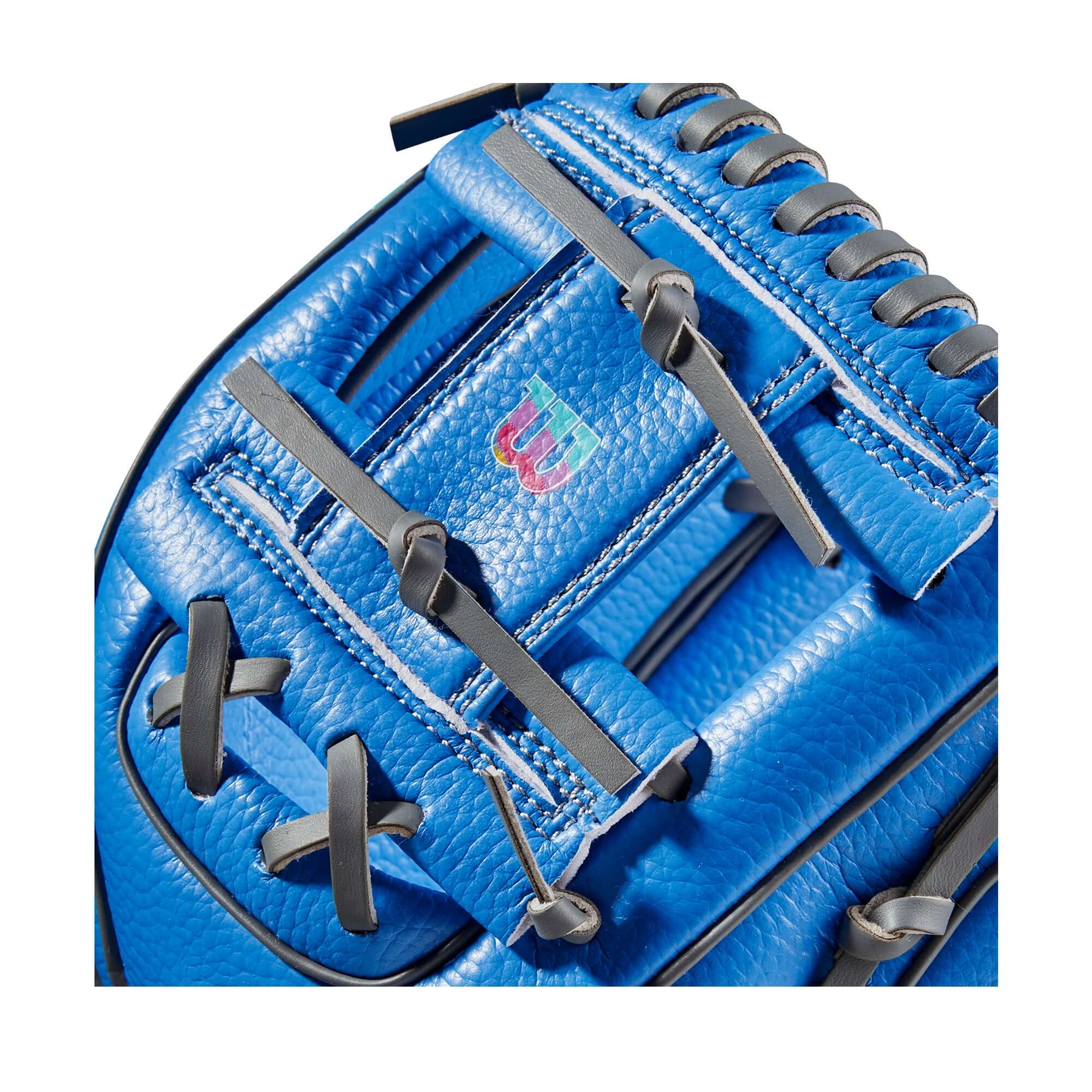 Wilson A200 Love the Moment 10 T-Ball Glove displaying Autism Speaks Blue colorway.
