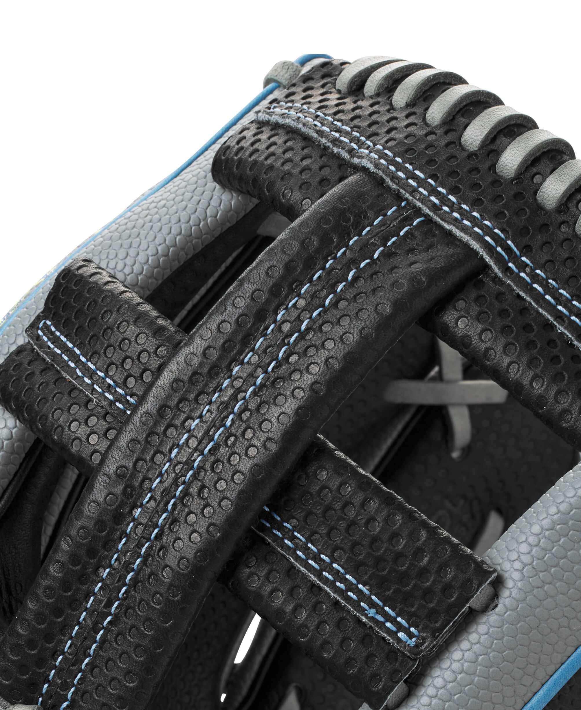 Close-up of the Wilson A2000 SC1786SS baseball glove showcasing the unique Single Post Web and textured materials.